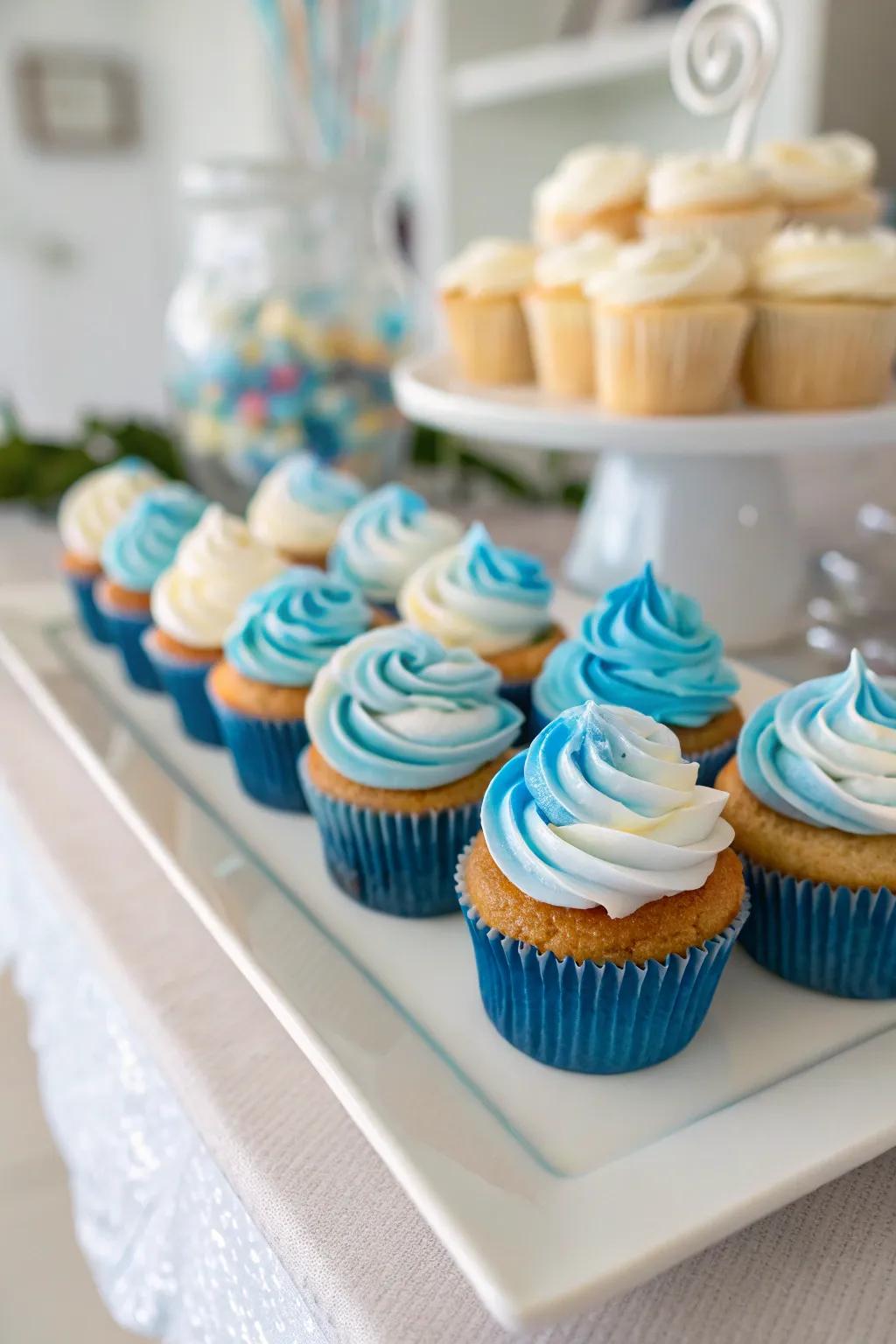 Timeless blue and white swirled cupcakes ready for a baby boy's shower.