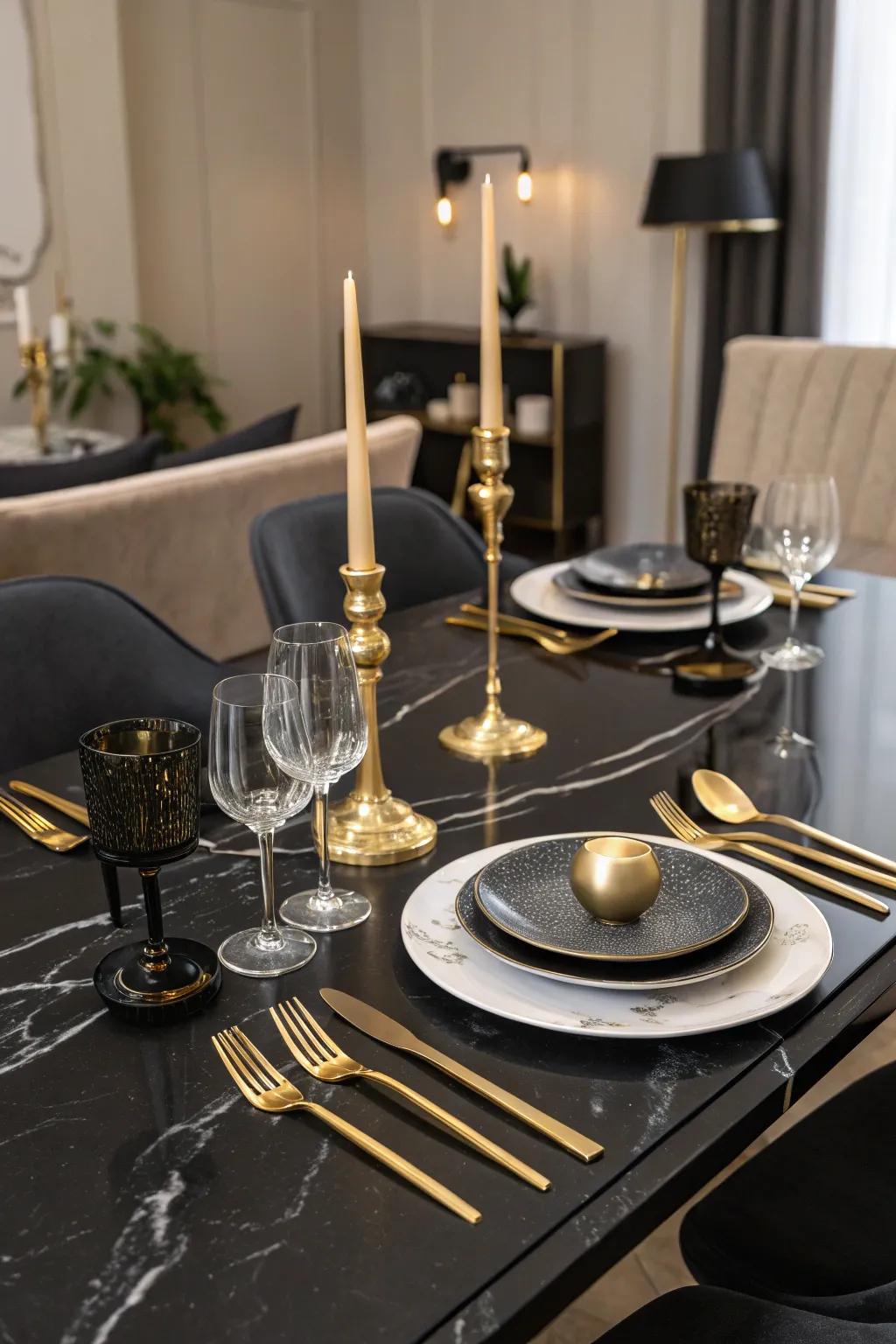 Black table setting with glamorous gold accents.