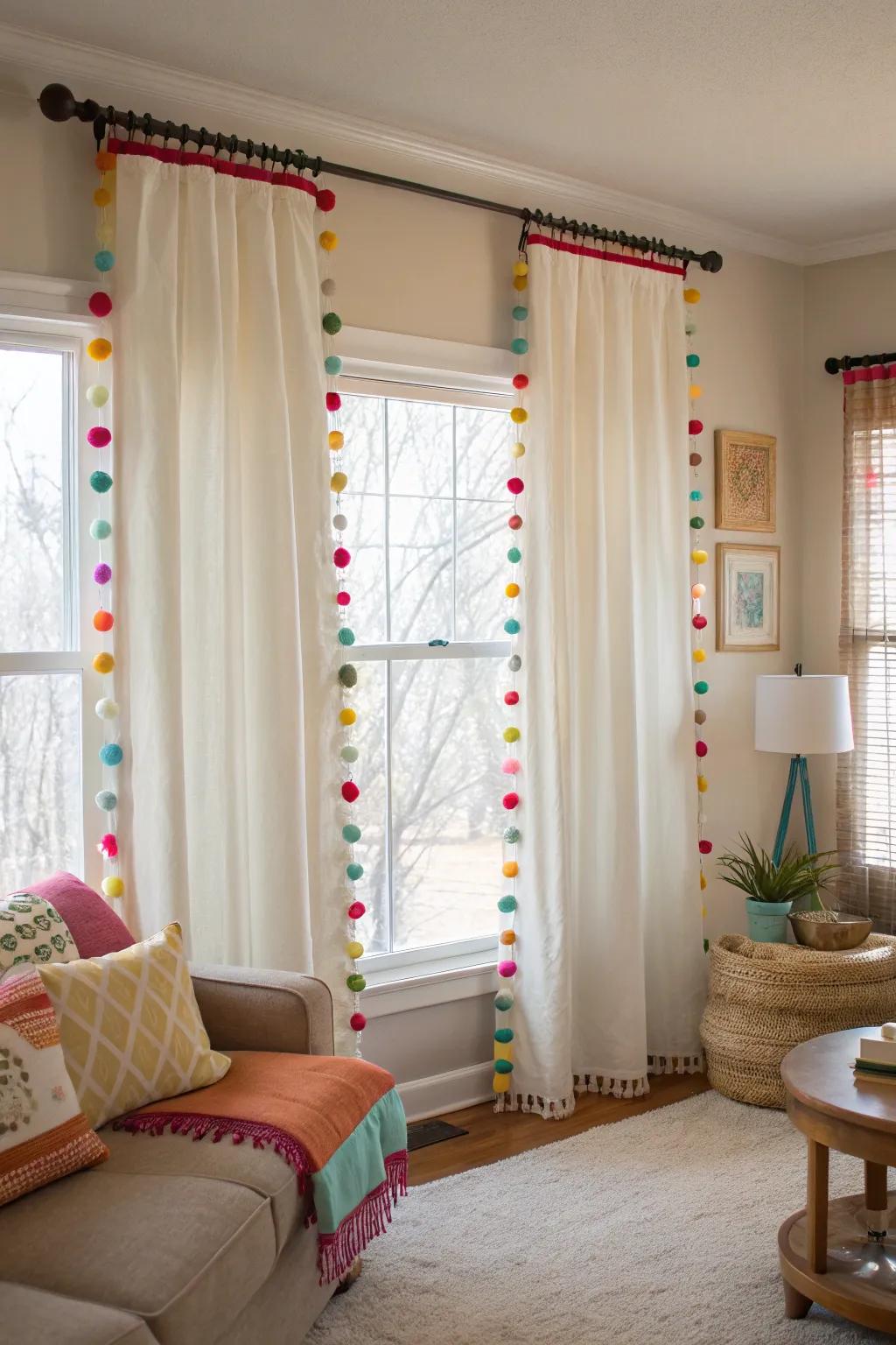 Living room curtains with playful pom pom trims.