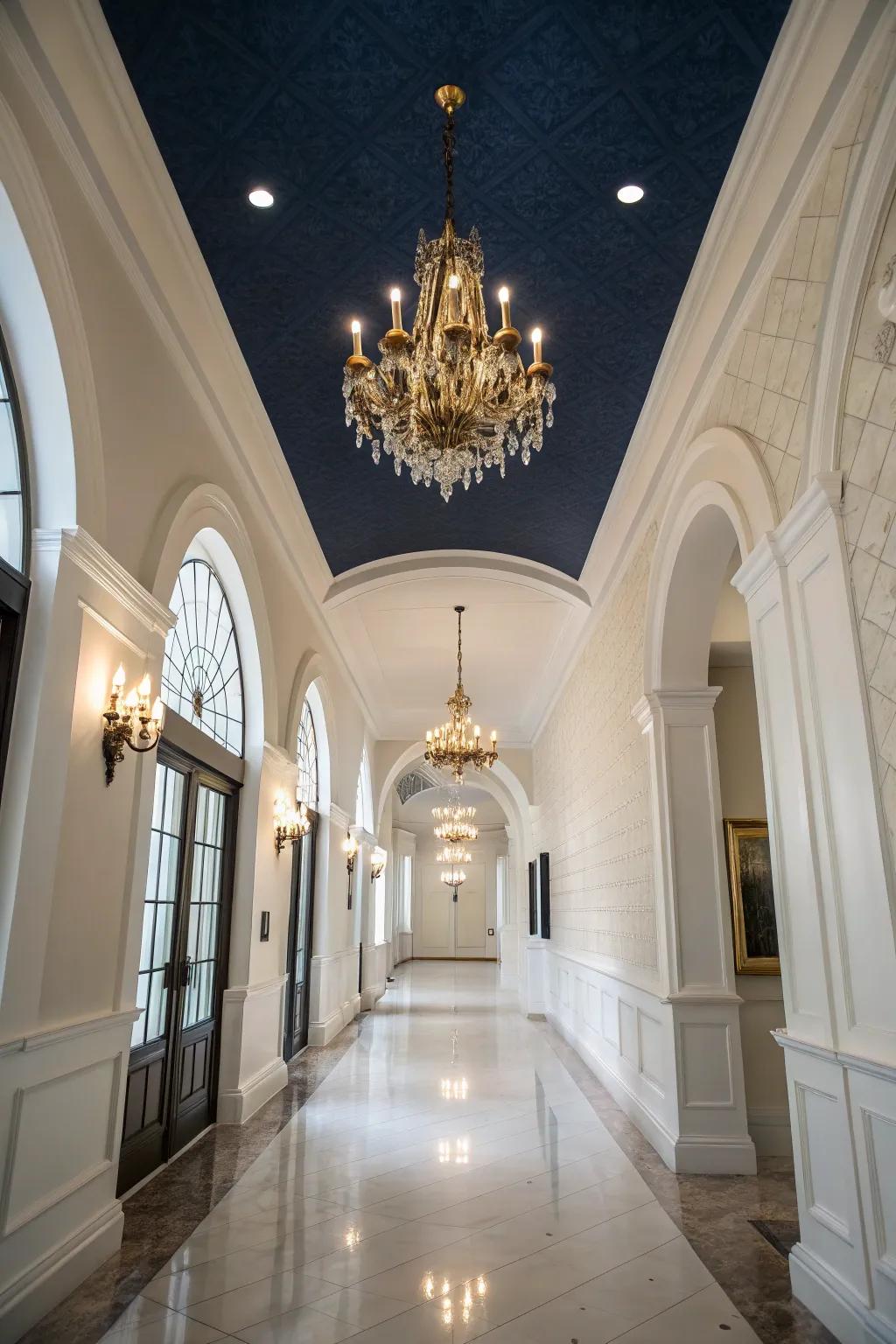 An elegant entrance with a striking dark blue ceiling.