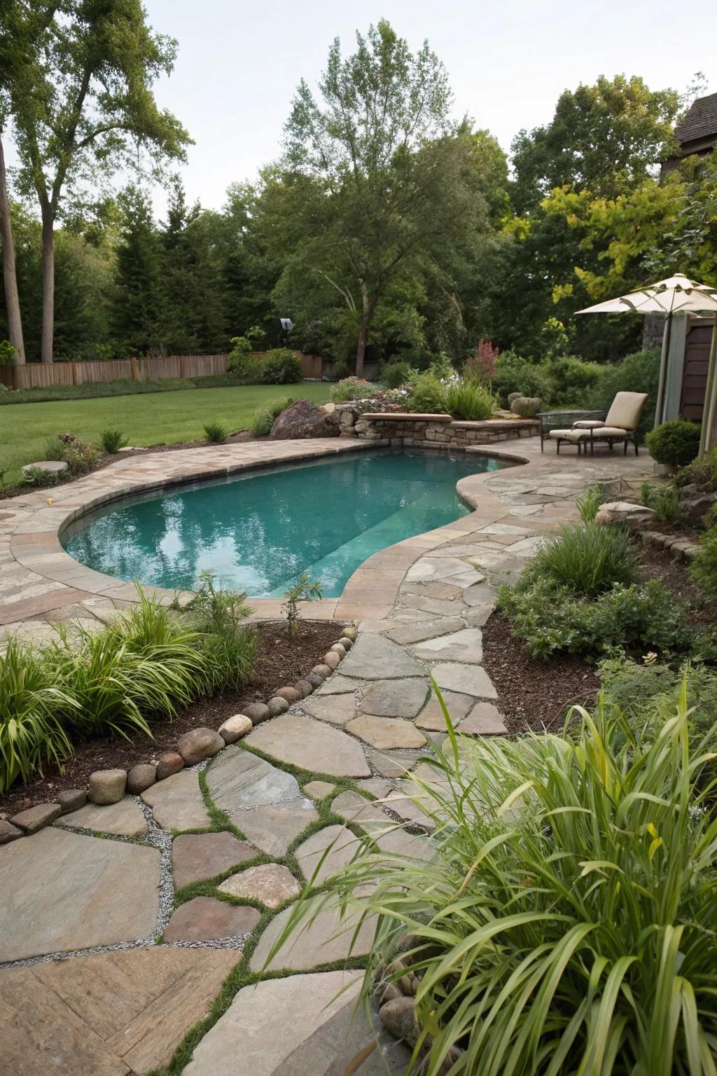 A freeform pool nestled within a naturalistic backyard setting.