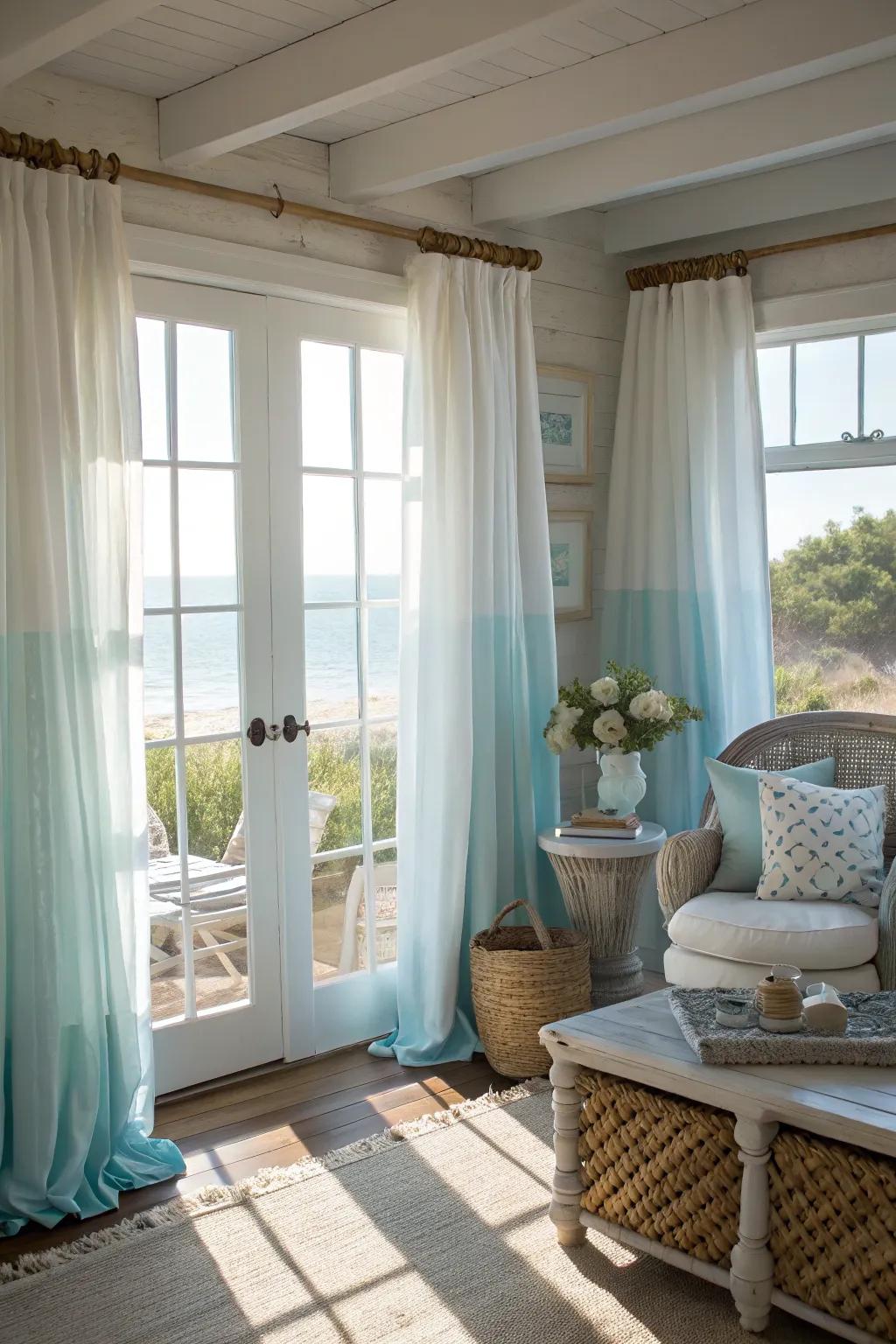 Achieve a beachy feel with airy, light-colored curtains.