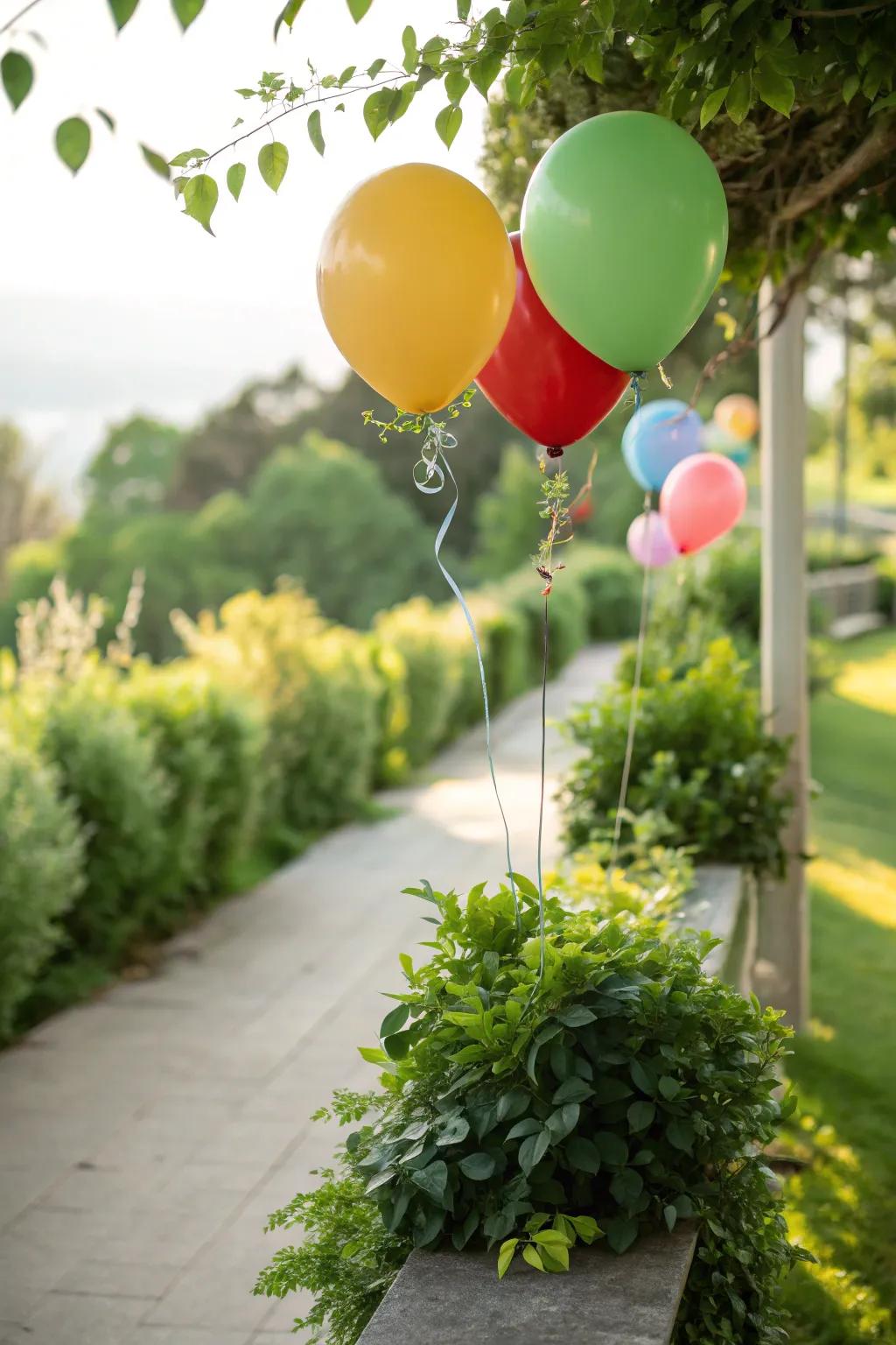 Balloons paired with greenery create a fresh and natural look.