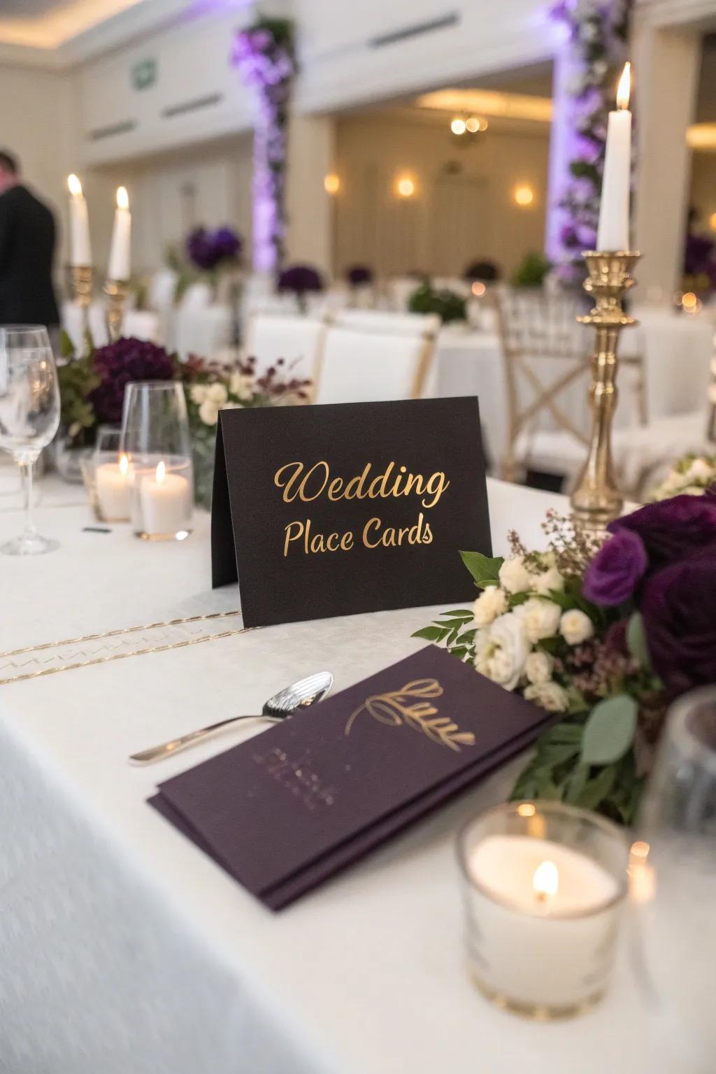 Themed place cards in black and purple.