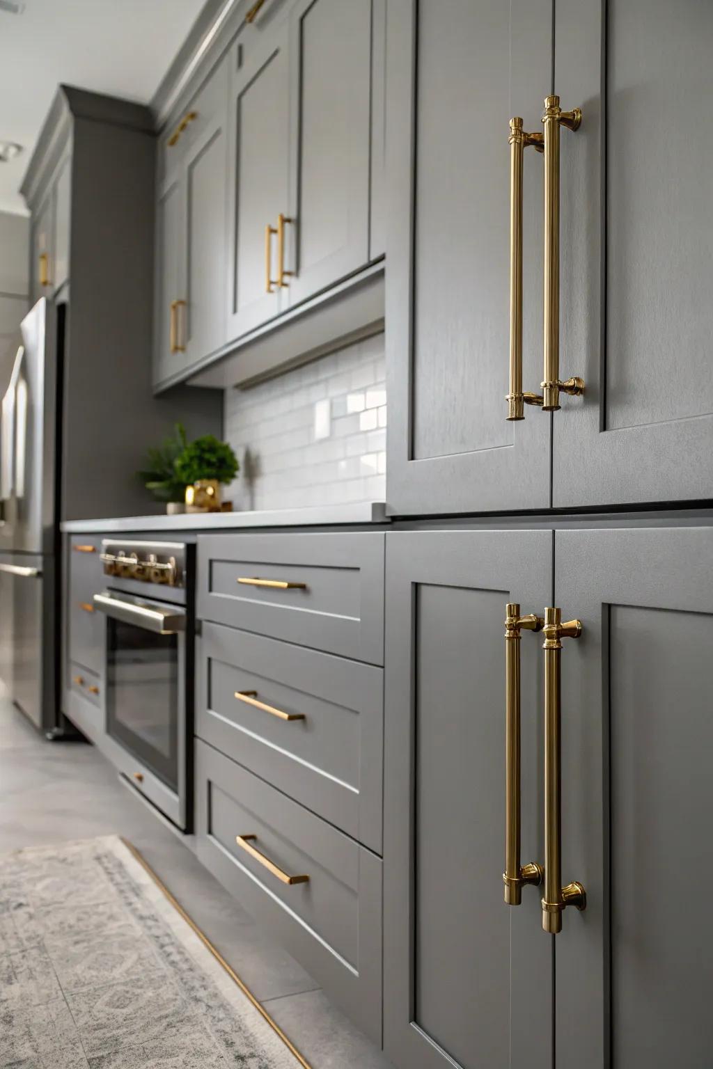 Metallic accents bring a touch of glamour to a grey kitchen.