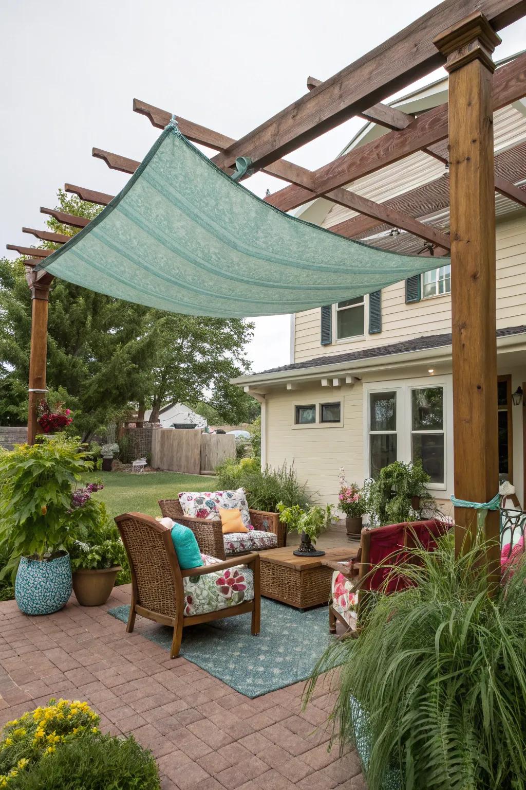 A DIY fabric shade adds color and sun protection to your pergola.