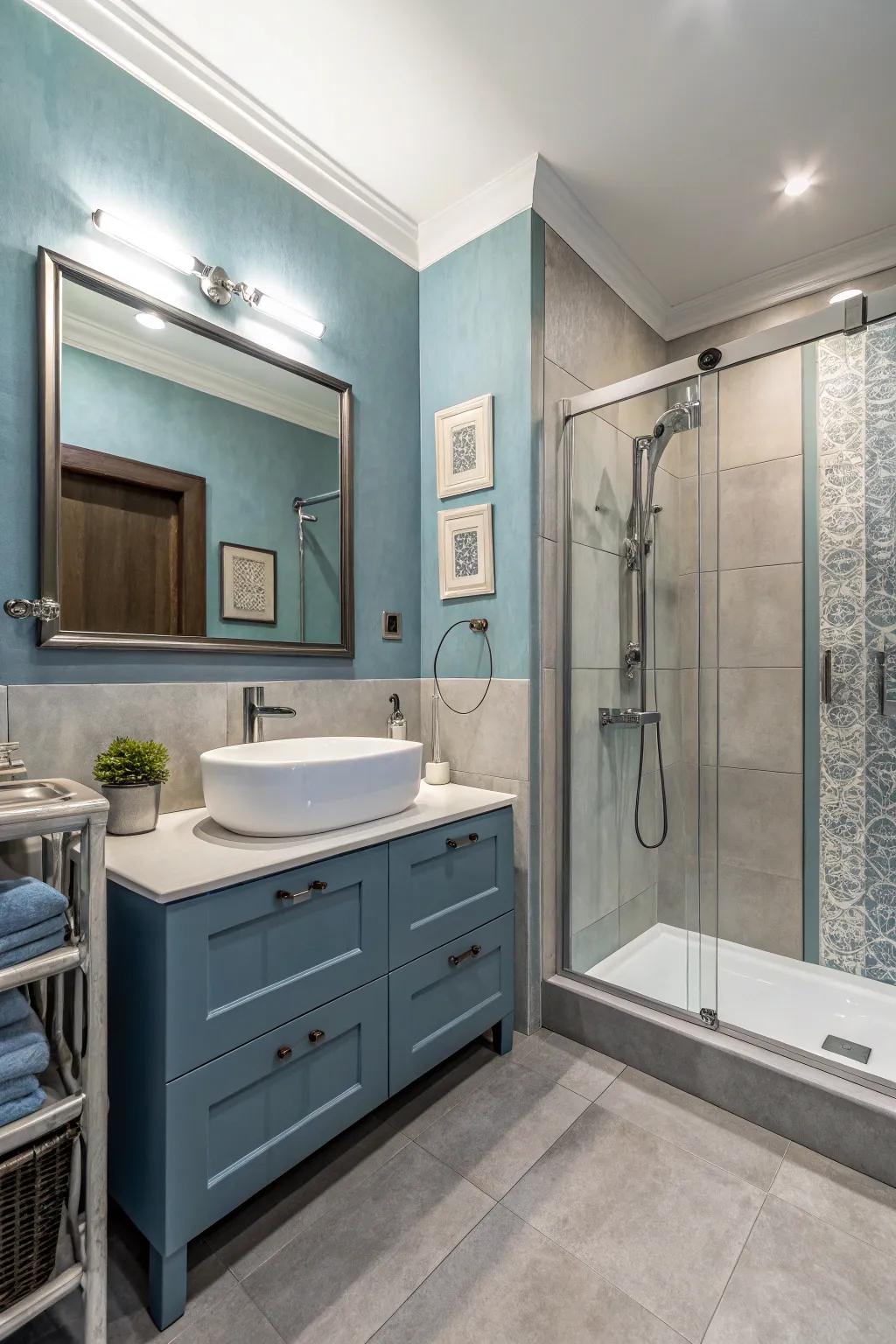 Blue and gray create a modern and harmonious bathroom design.