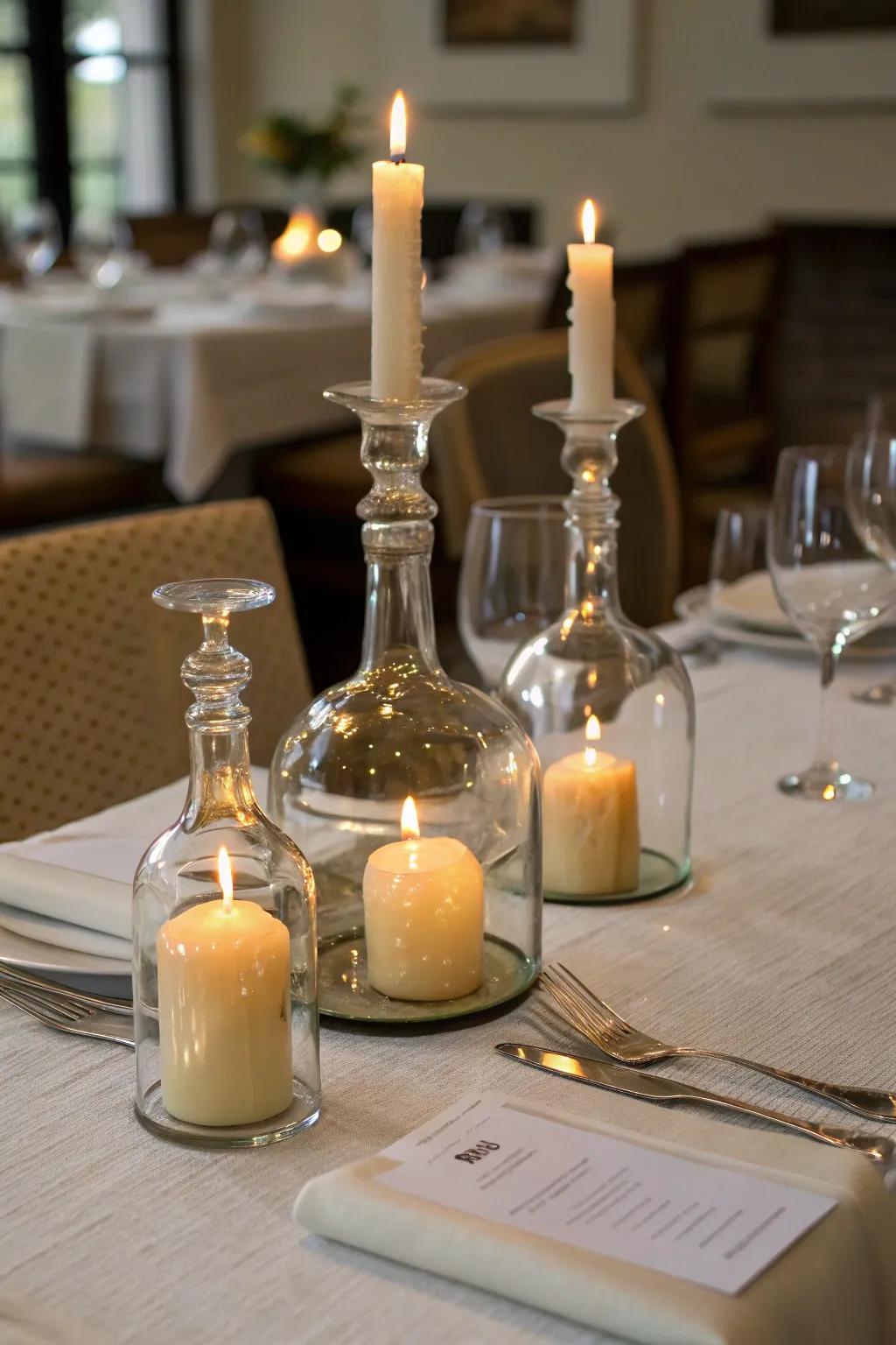 Decanters repurposed as candle holders for a cozy dining setup.