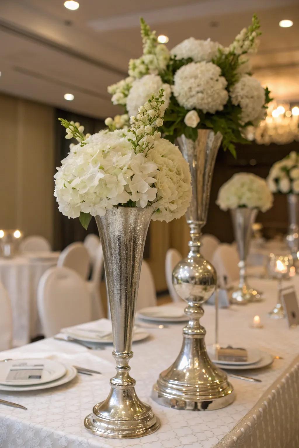 Add timeless beauty with silver and white floral arrangements.