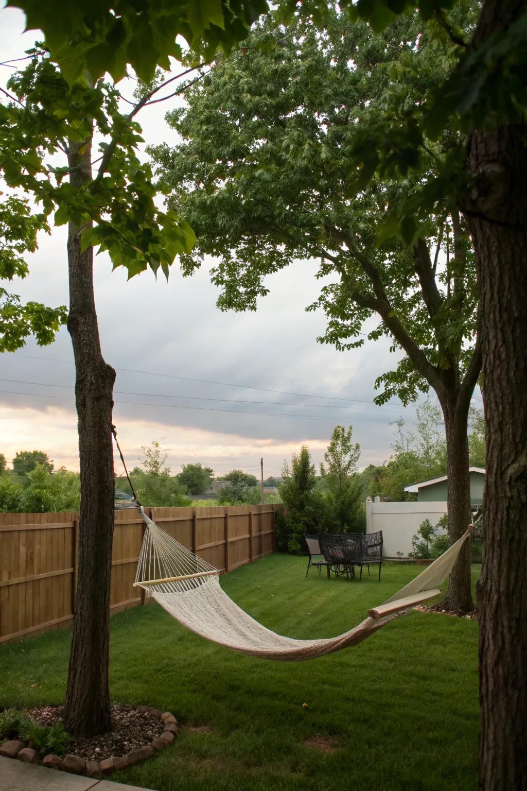 Hammocks offer a serene escape for relaxation in your backyard.