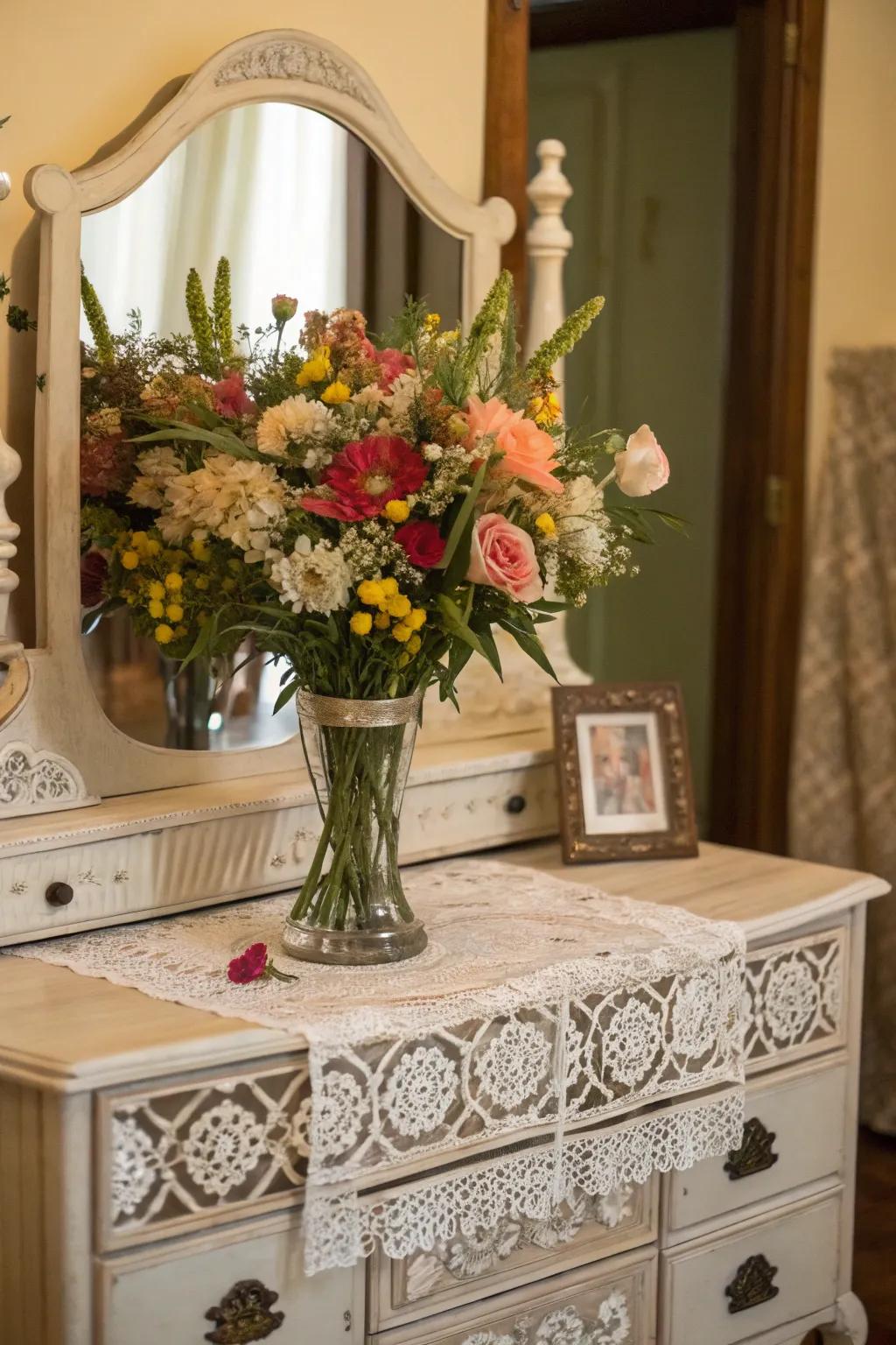 Fresh flowers add a vibrant and natural touch to vintage vanities.
