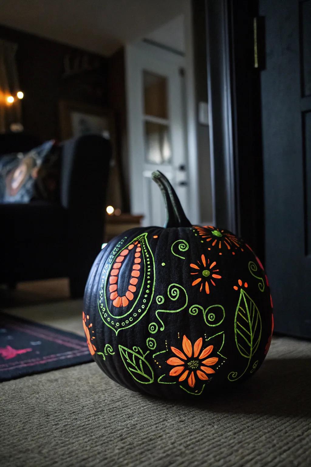 A black pumpkin with glow-in-the-dark designs, adding a magical touch to nighttime decor.