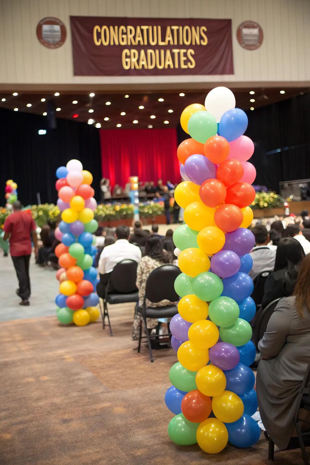 Colorful balloon bouquets adding vibrant decor to the graduation venue.