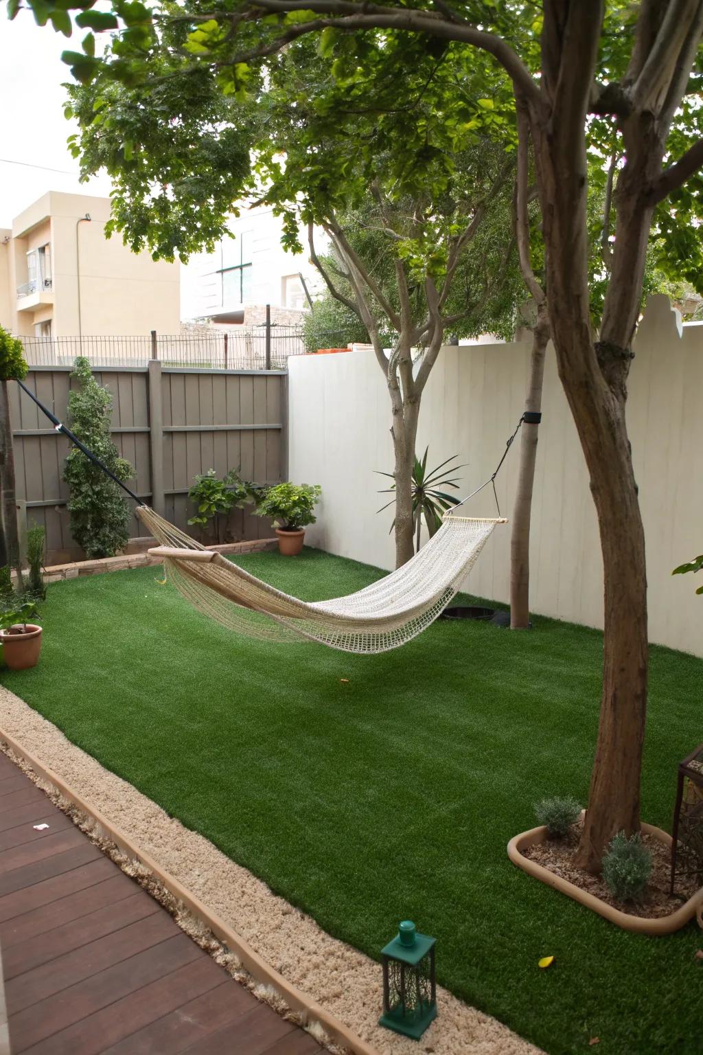 A hammock haven for relaxation over artificial grass.