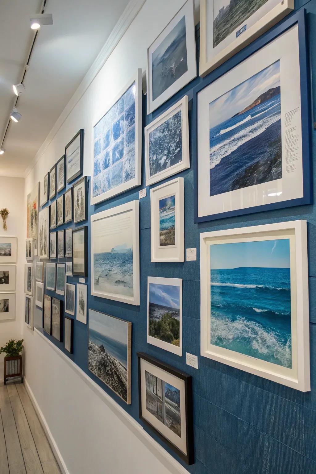 A gallery wall with blue-toned art adds a curated and personal touch.