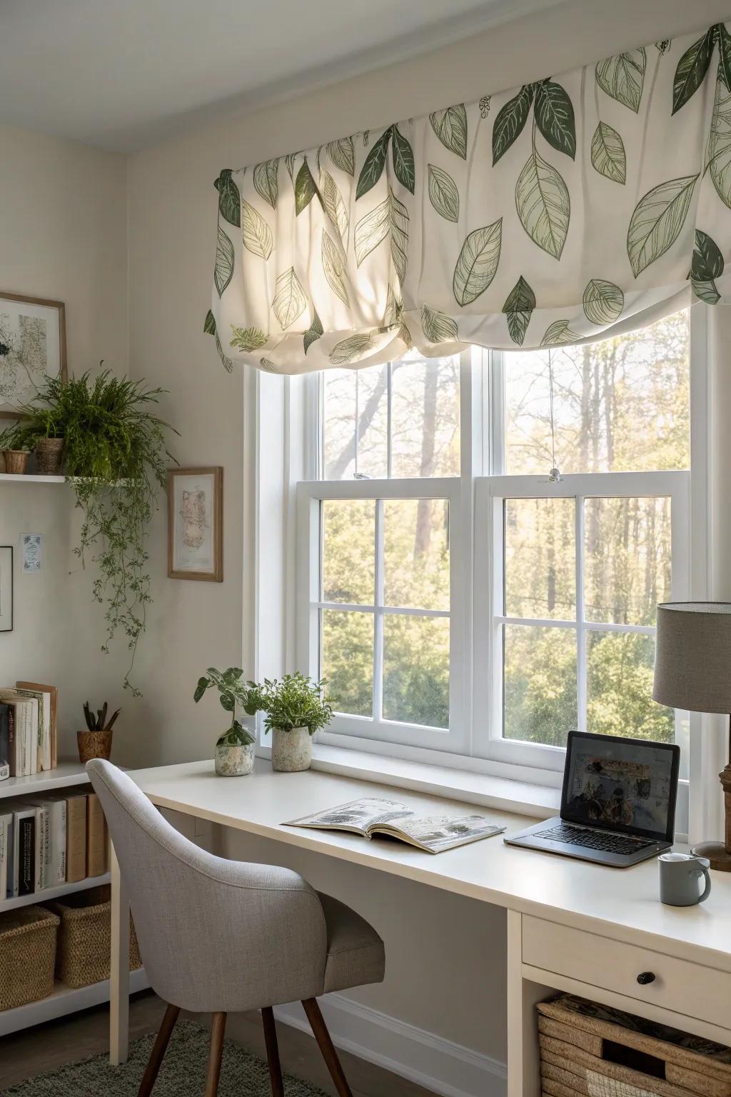 A window with a nature-inspired valance in a tranquil home office.
