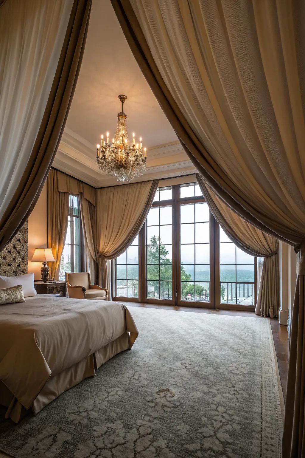 Dramatic drapery enhances the elegance and scale of this large bedroom.