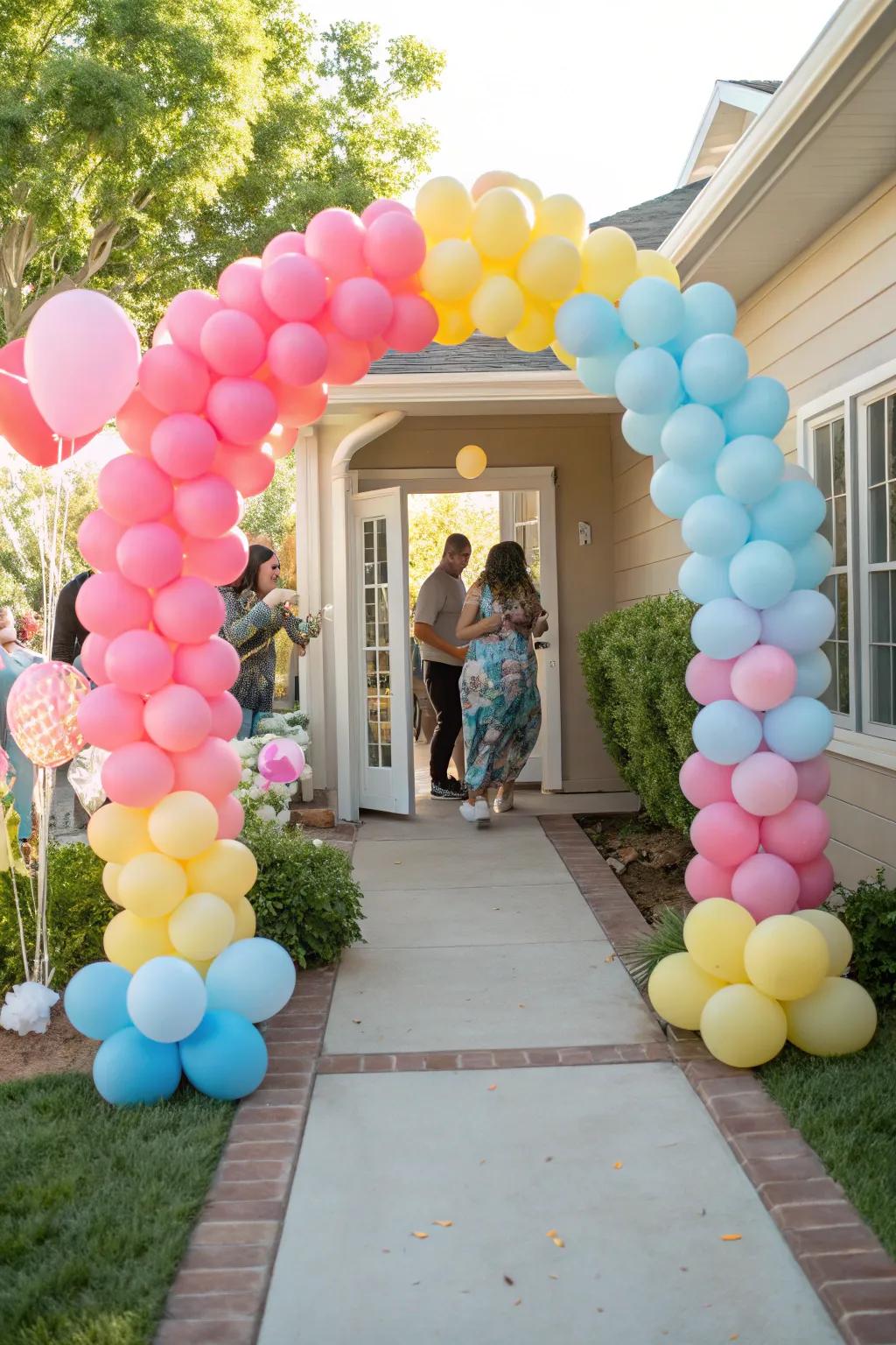 A lively balloon arch brings joy and color to the baby shower entrance.