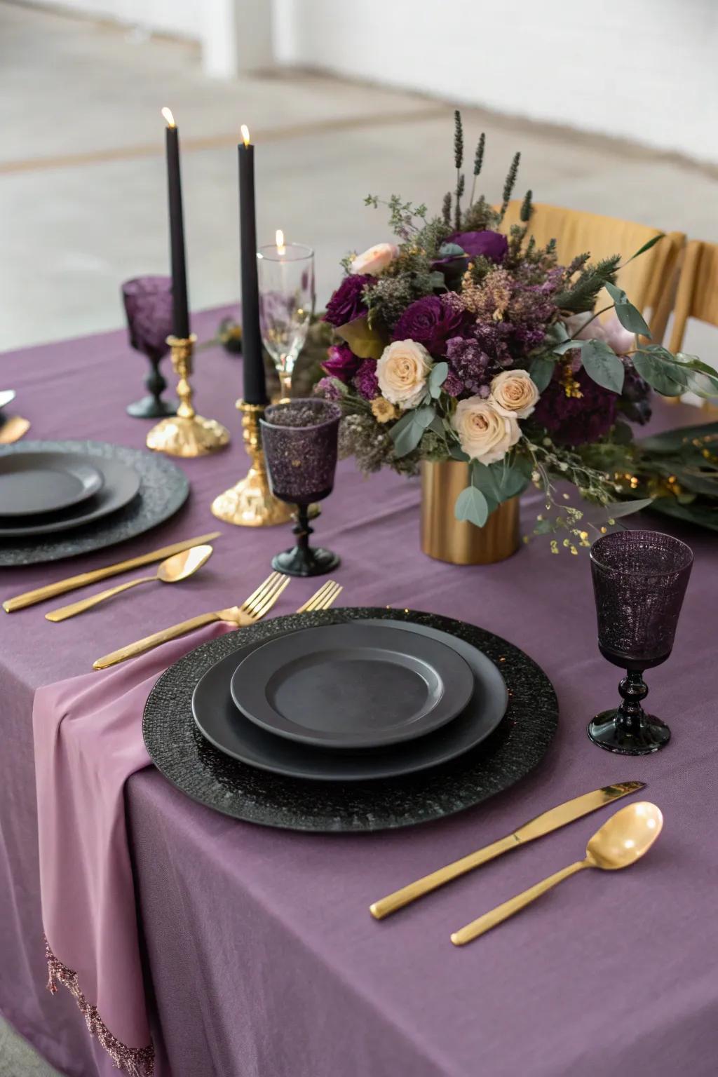 A sophisticated table setting featuring purple linens and black dishware.