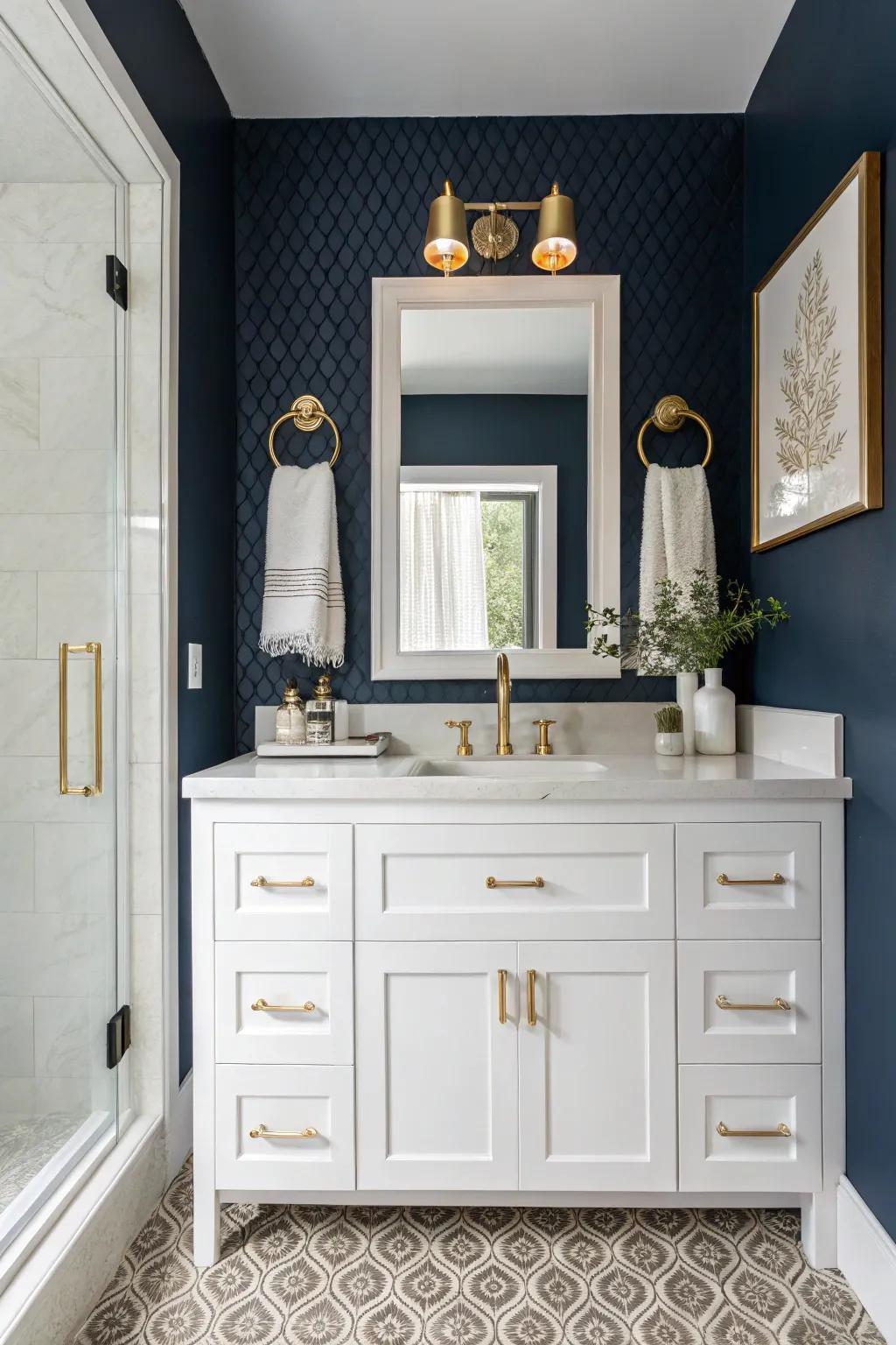 A sophisticated navy blue bathroom with luxurious gold accents.