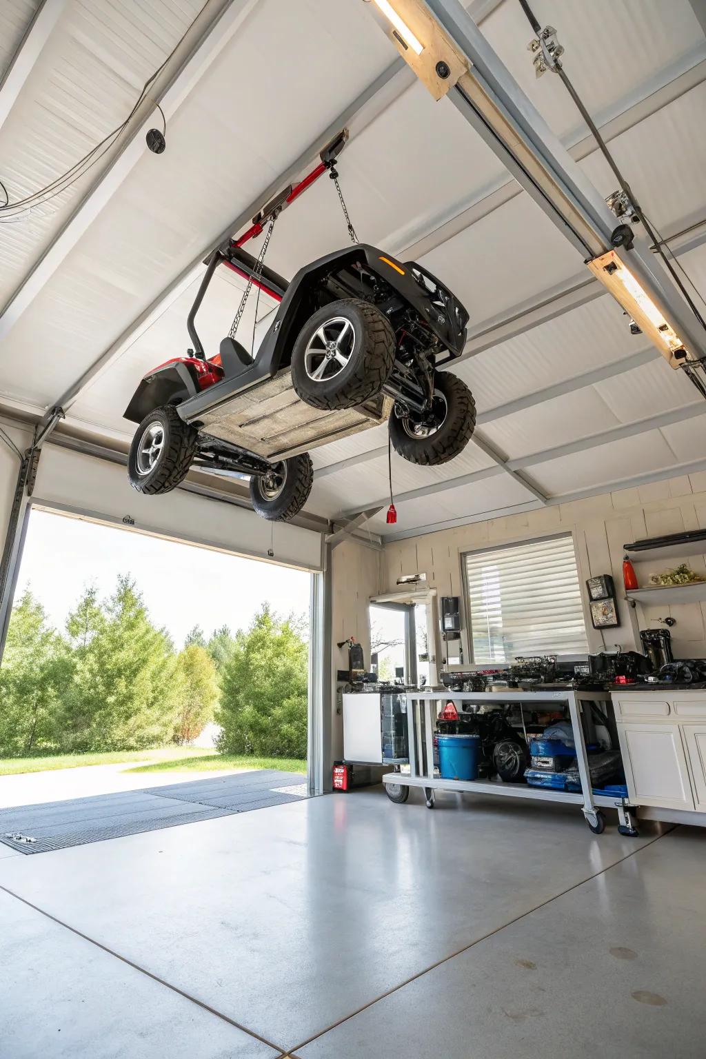 Ceiling hoist system lifting a power wheel to create more space.