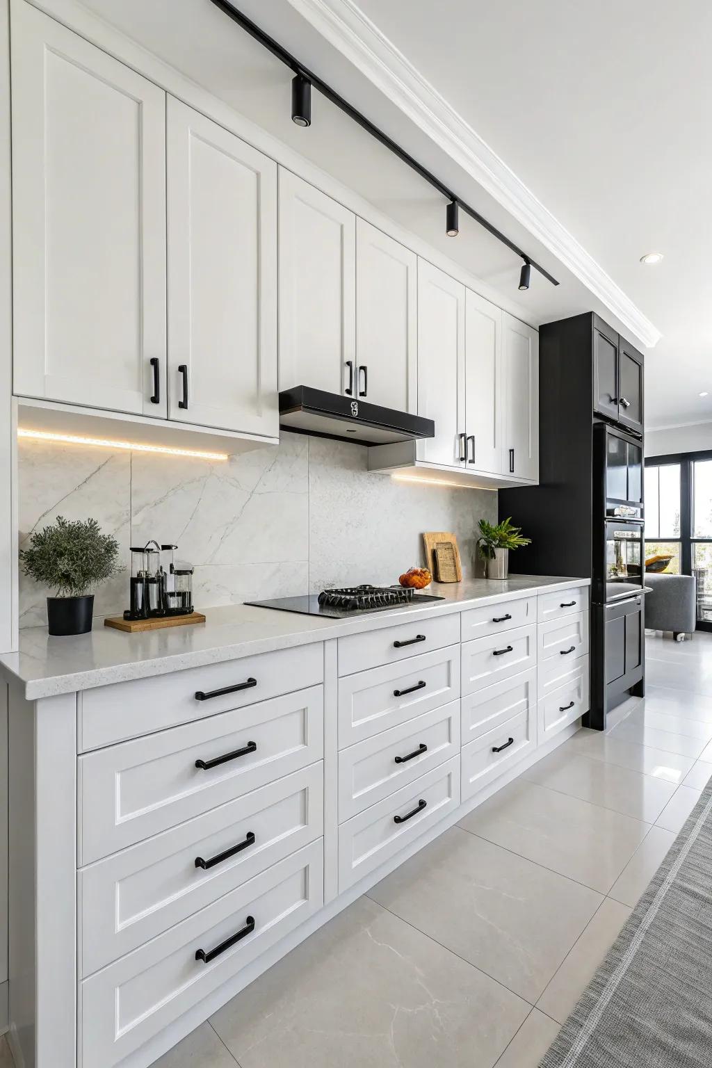 A modern kitchen featuring a striking contrast with matte black hardware.