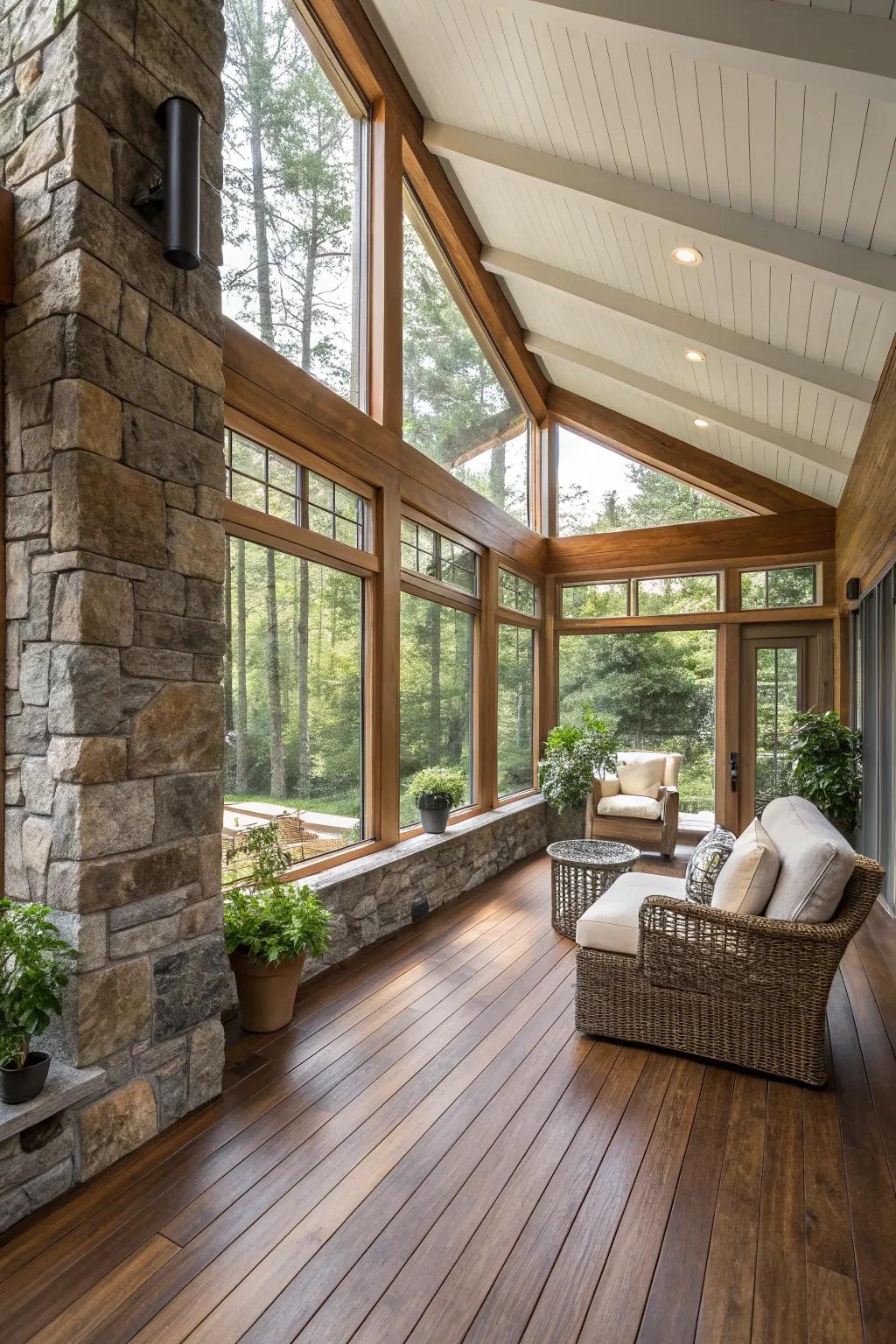 Natural wood and stone bring earthy charm to a modern sunroom.