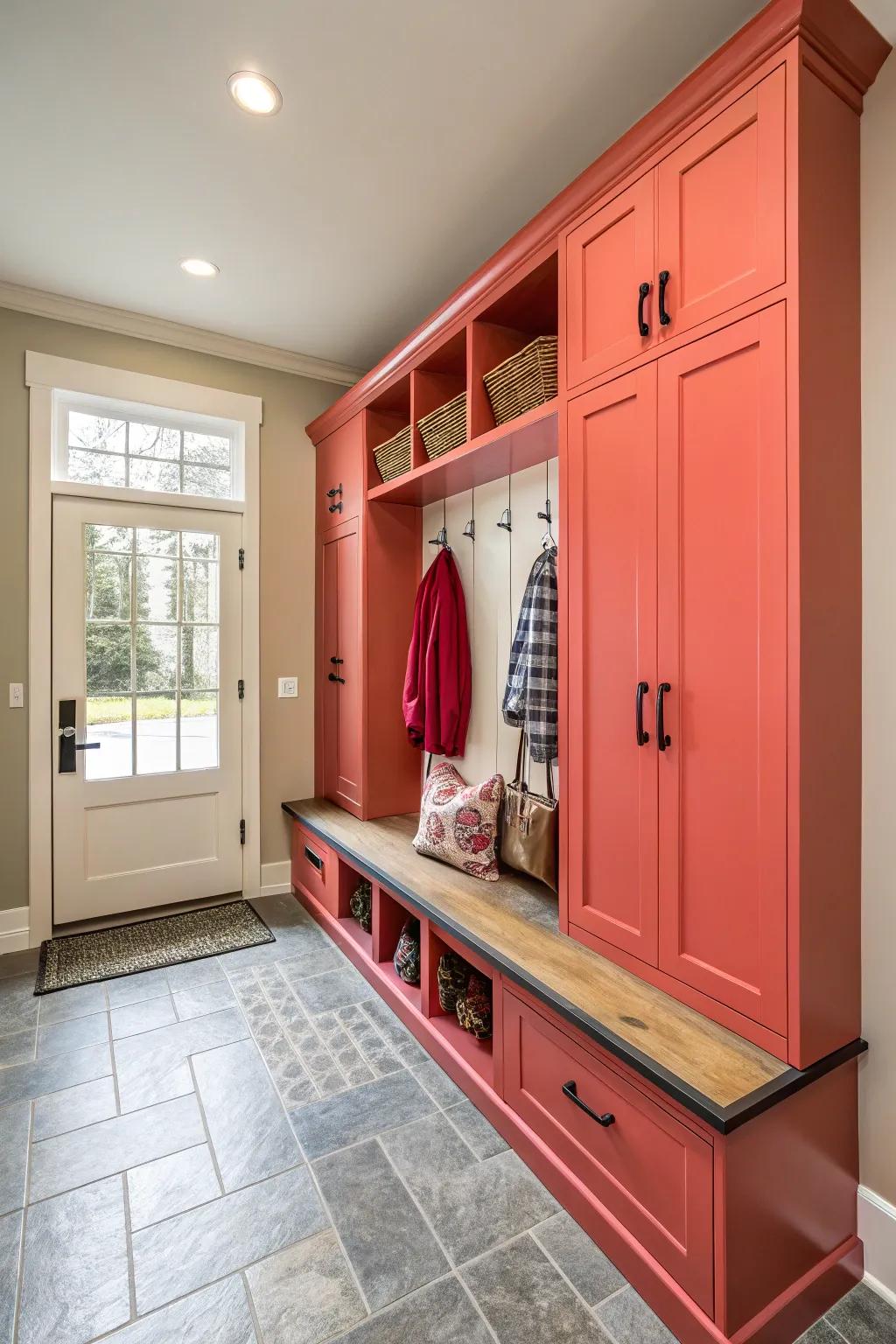 Vibrant cabinetry adds personality and warmth to the mudroom.