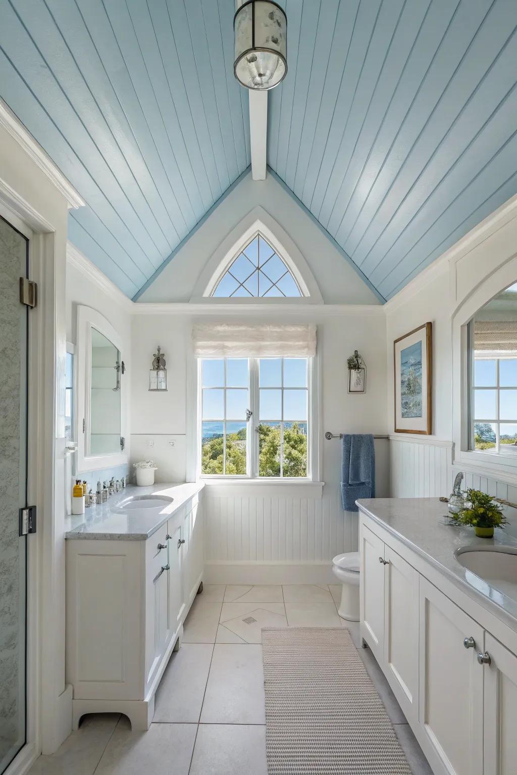 A sky blue vaulted ceiling brings a serene ambiance to this bathroom.