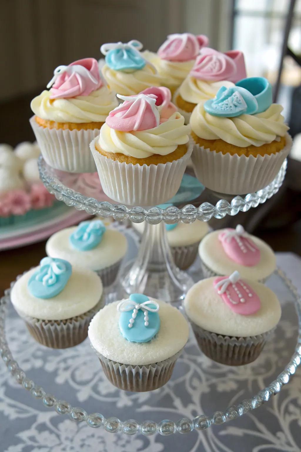Delightful baby bootie-topped cupcakes add a whimsical touch.