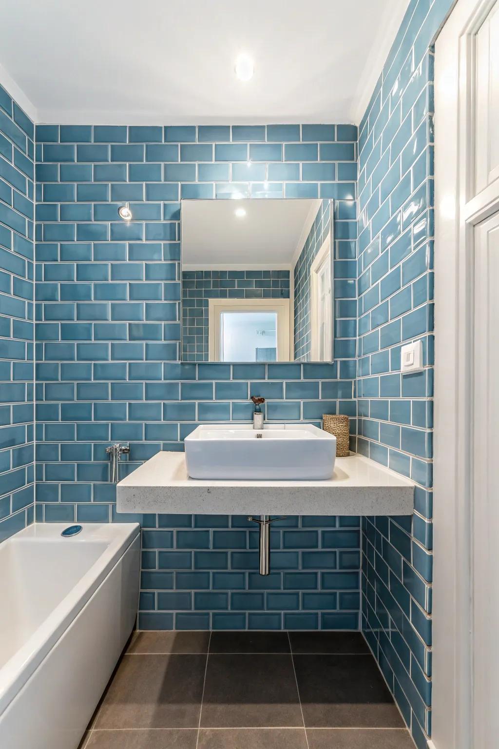 Blue subway tiles add a modern touch to this bathroom.