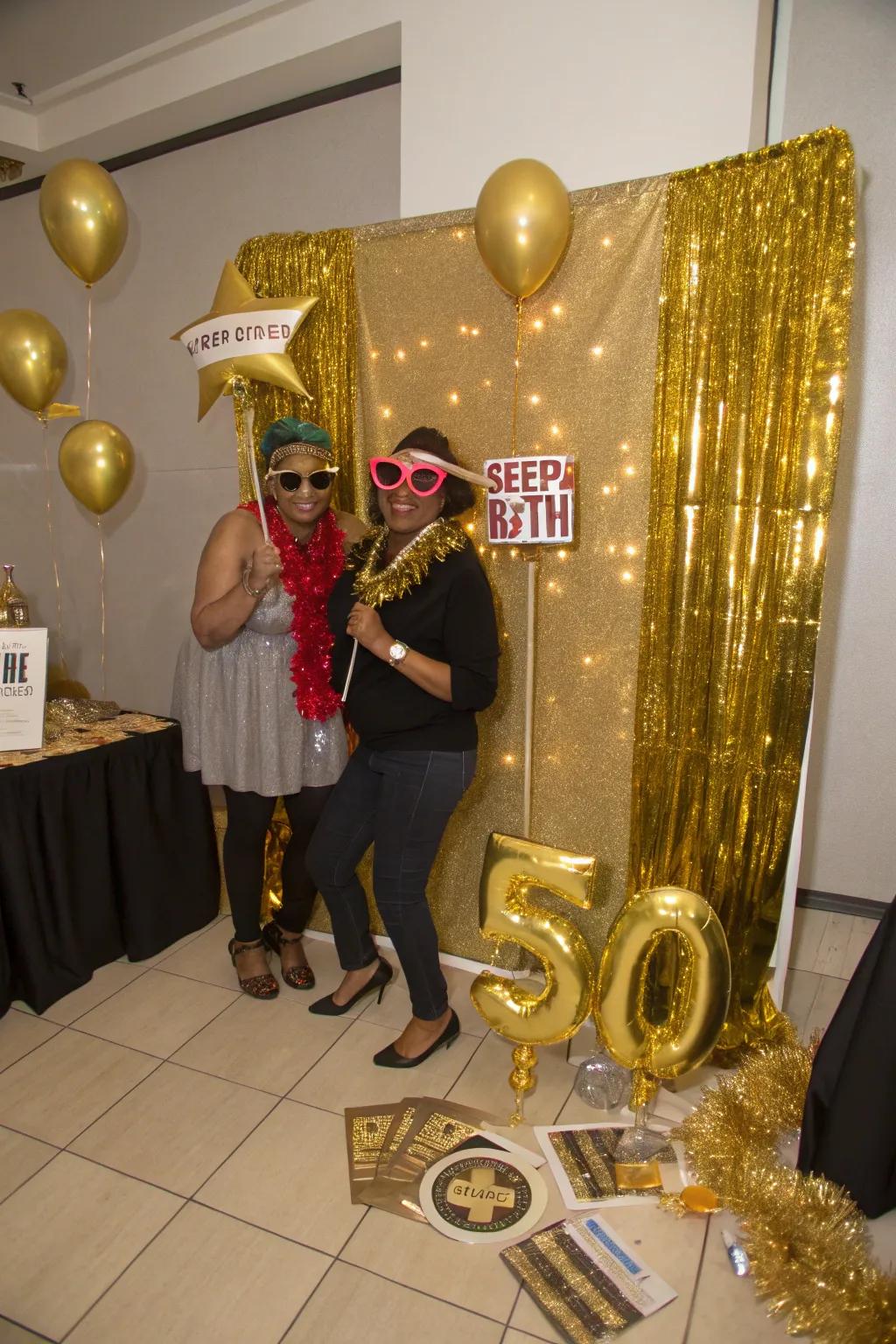 A gold-themed photo booth captures fun memories for guests.