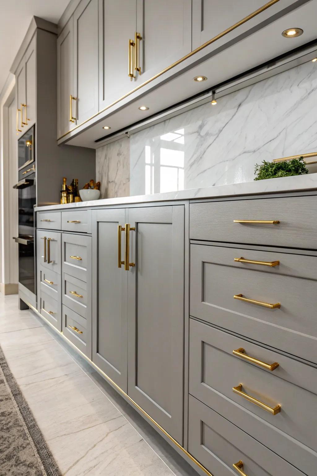 Brass hardware adds a touch of elegance to gray cabinets.