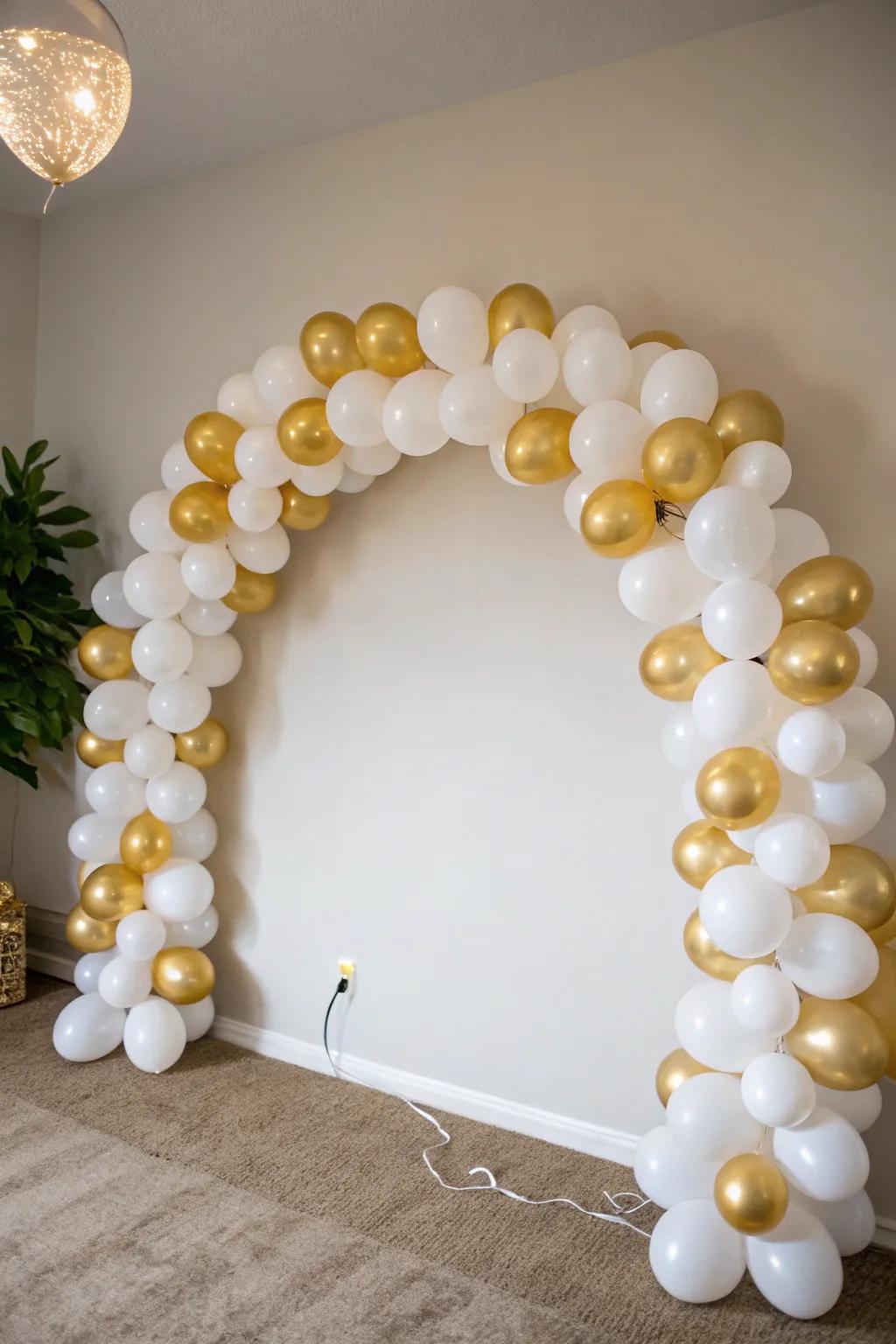 A chic minimalist balloon arch with a monochrome palette.