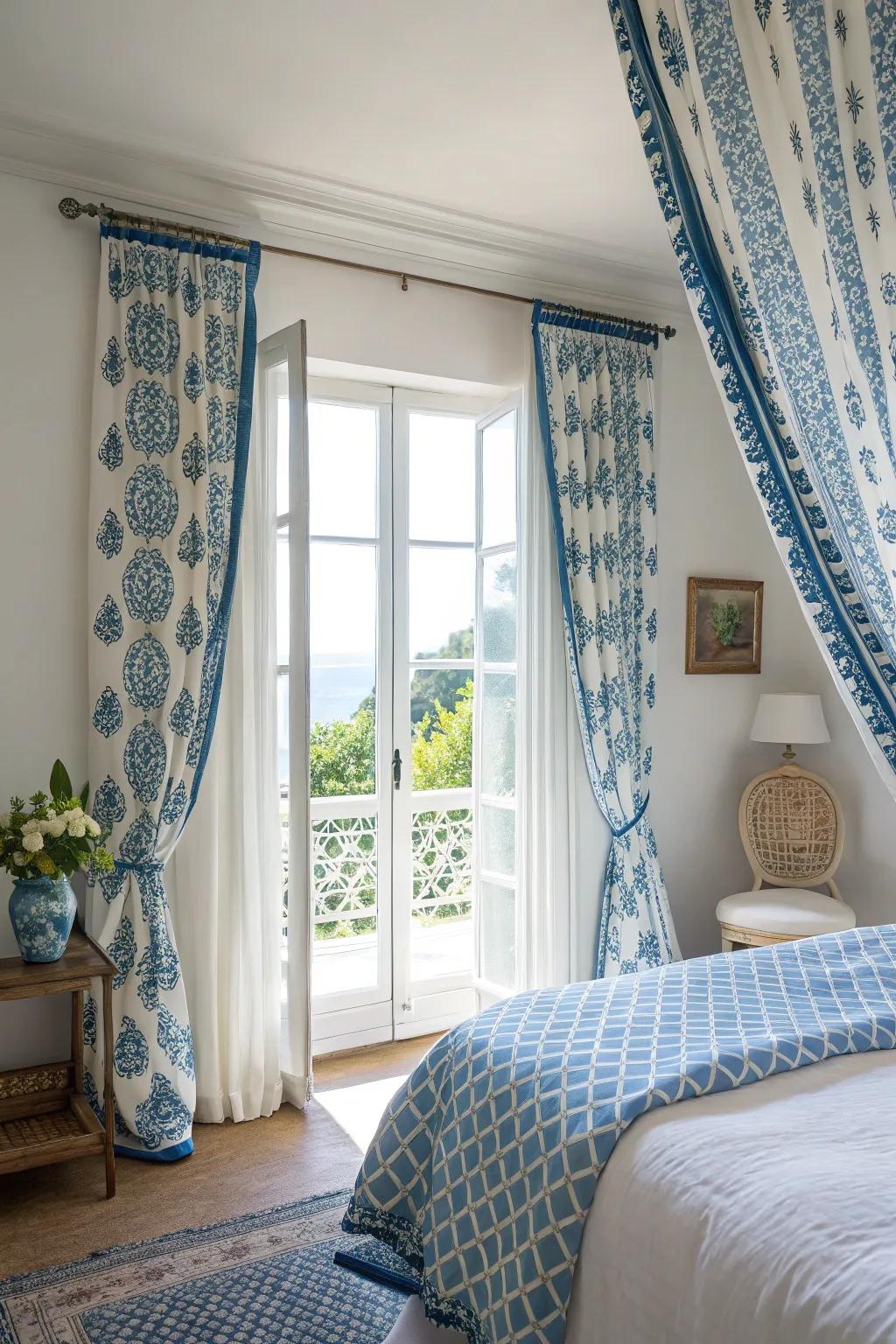 Patterned curtains in blue and white add style and function to the bedroom.