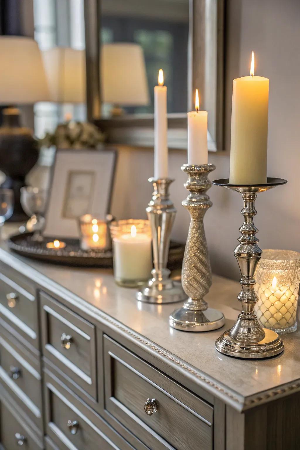 Candles bring warmth and elegance to the dresser decor.