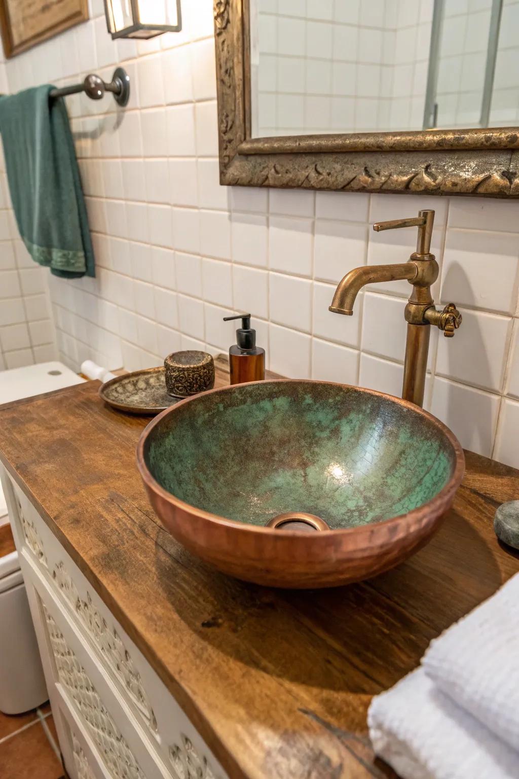 This copper sink showcases the beauty of its natural patina, adding depth to the bathroom's design.