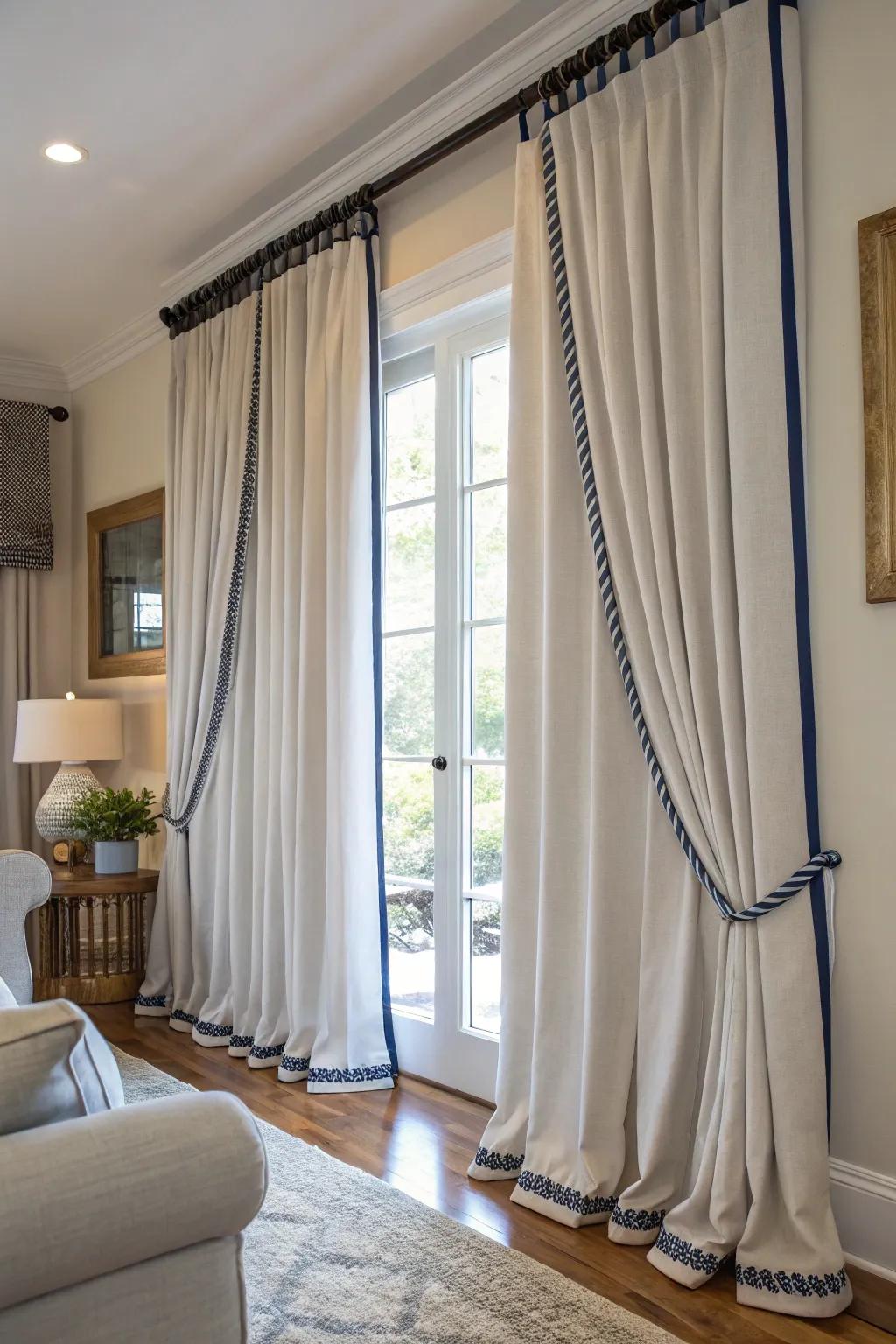 Crisp looking curtains with contrasting cord trims.