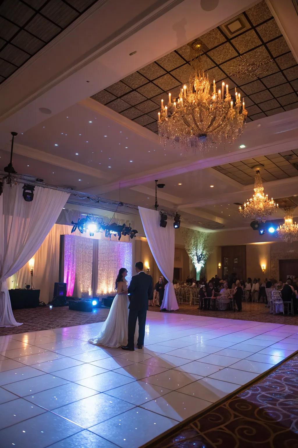 Spotlights and uplighting drawing attention to the dance floor.