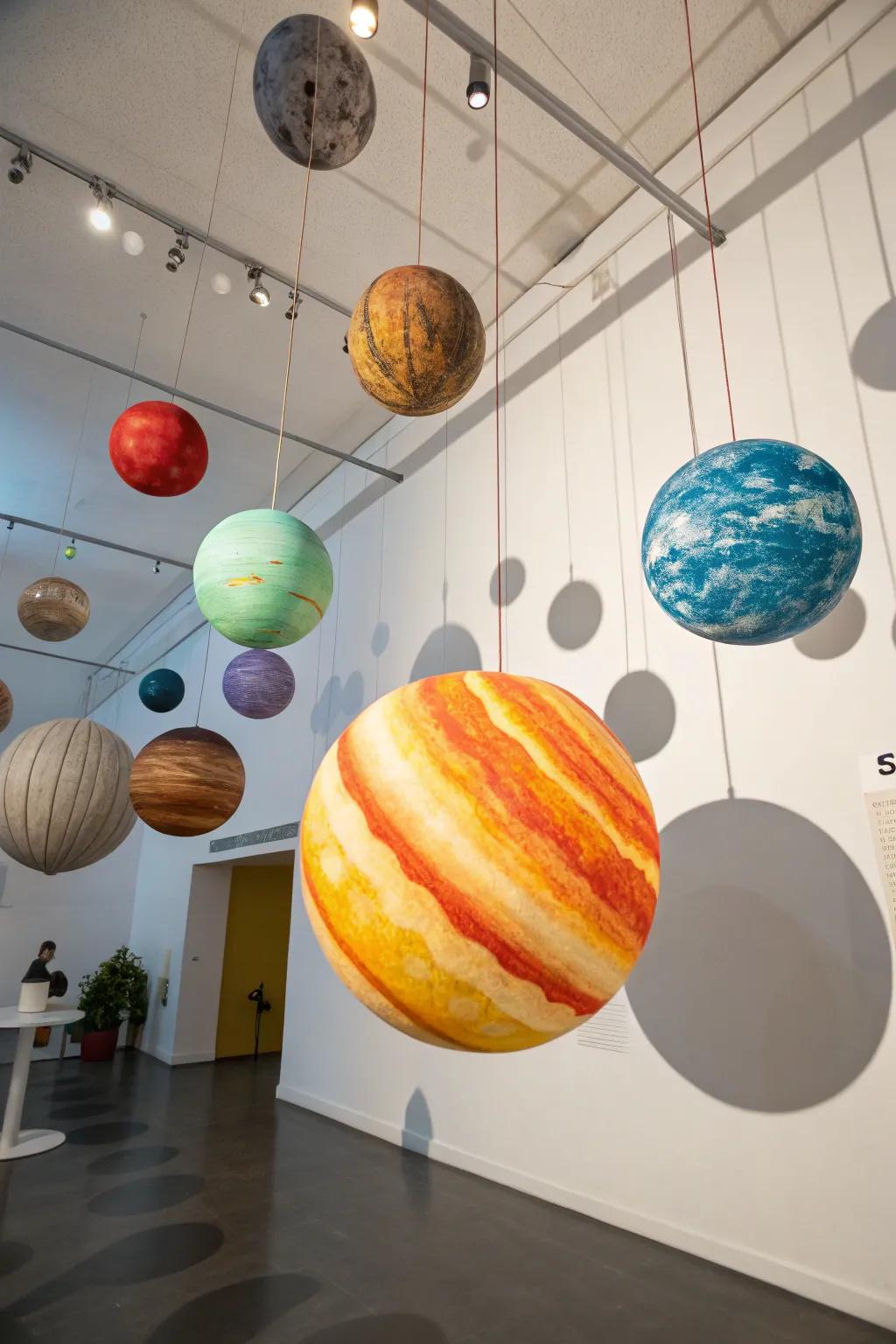 Bring the solar system indoors with hanging planet models.