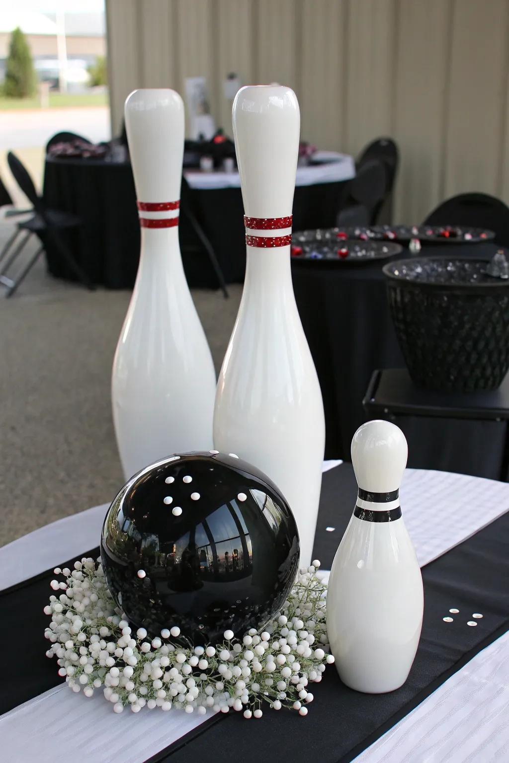 A chic black and white bowling-themed centerpiece for modern elegance.