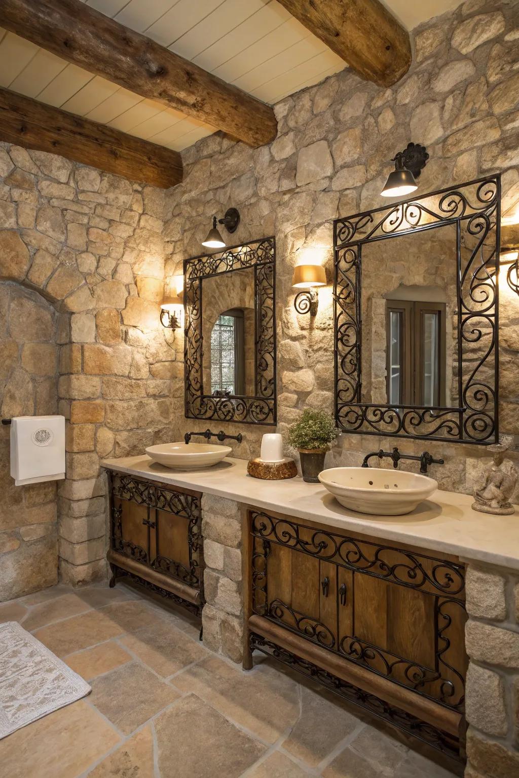 A stone bathroom featuring rustic accents, including wrought iron mirrors.