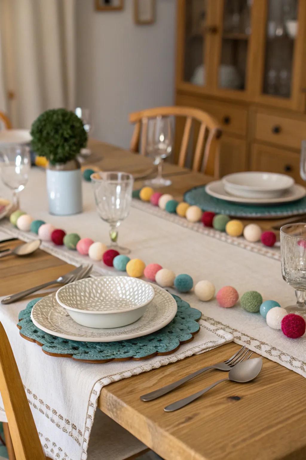 Felt garlands used as table runners create a striking centerpiece for meals.