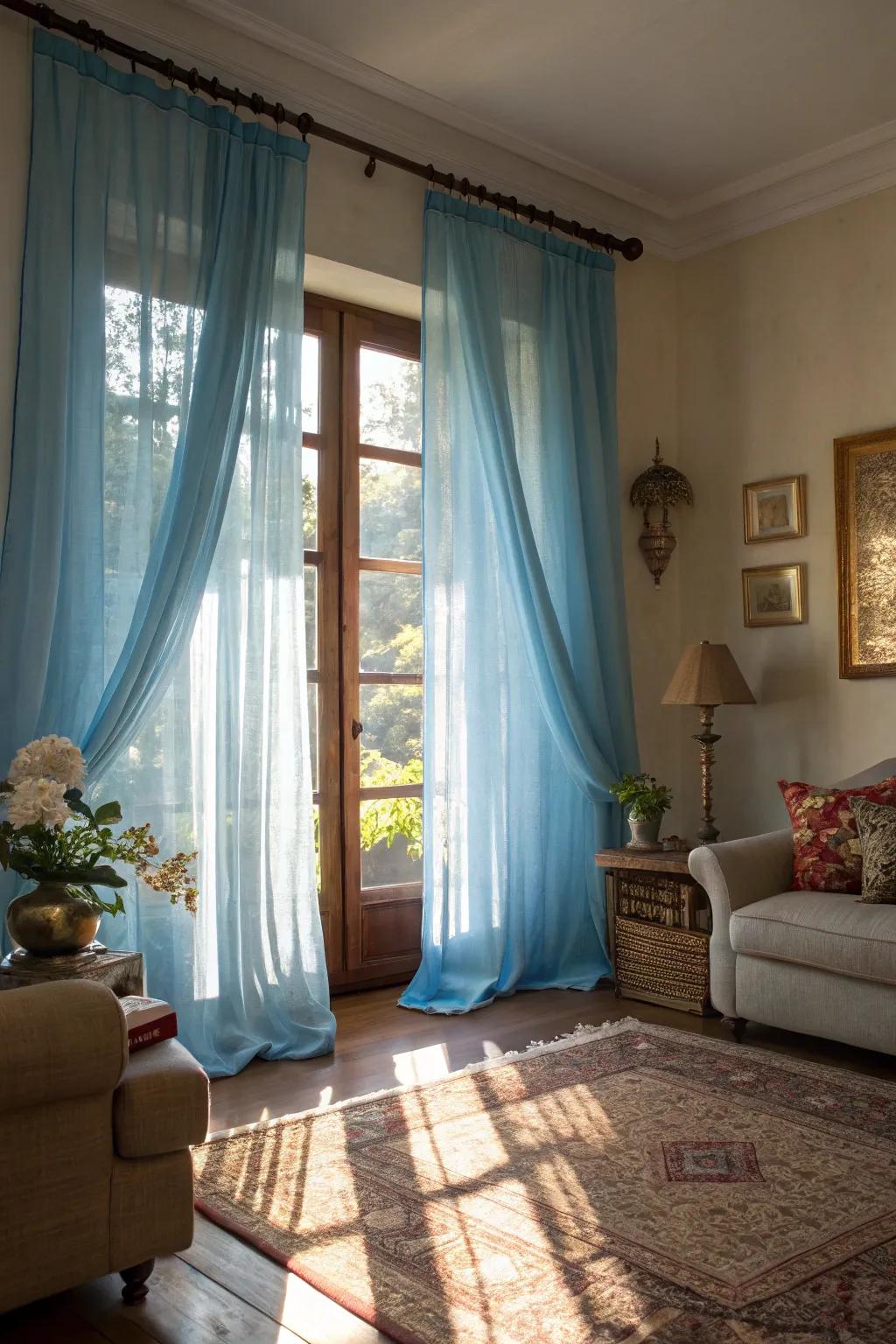 Sheer blue curtains create a play of light and shadow, adding depth and visual interest to the space.