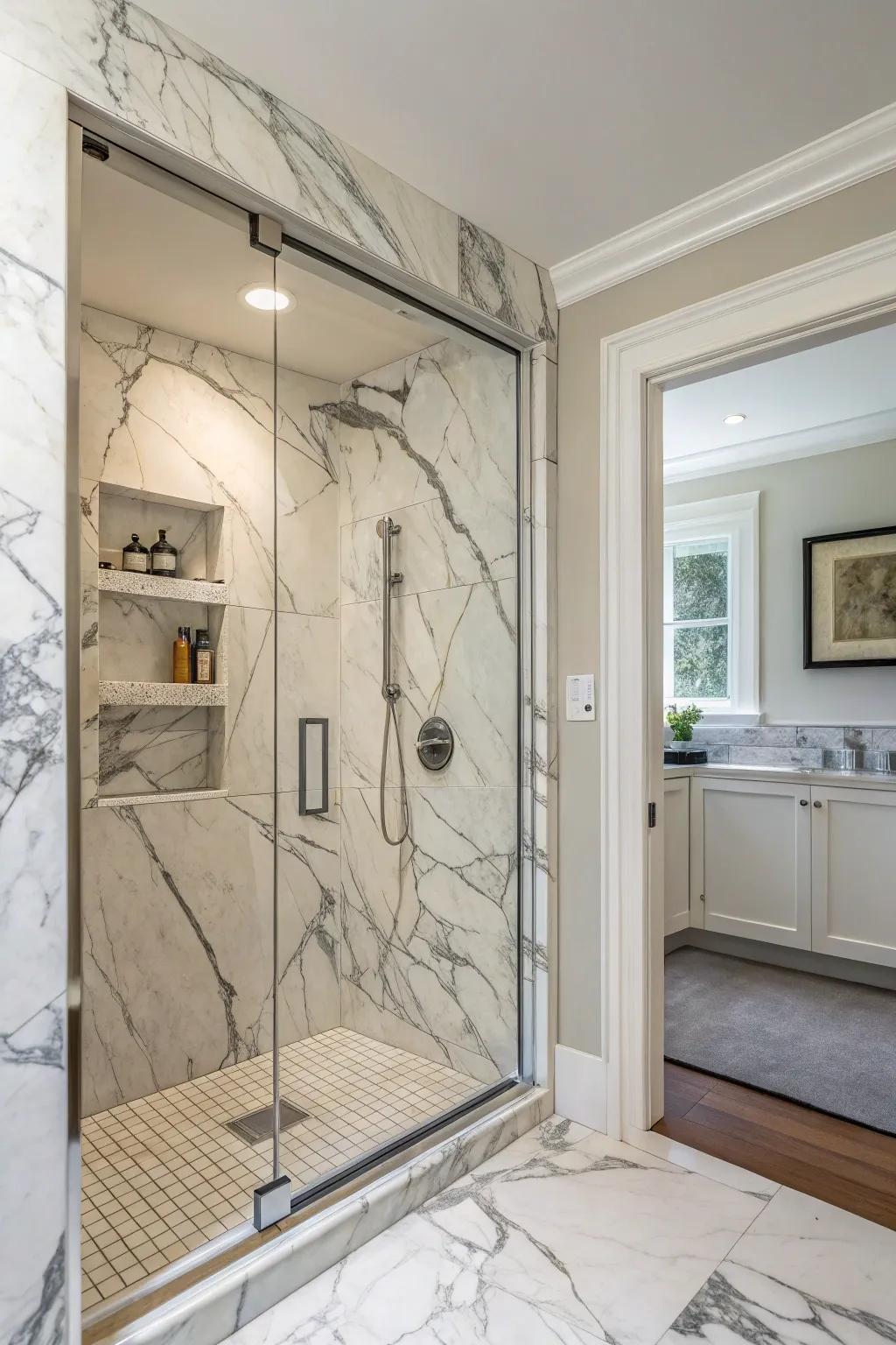 Calacatta marble brings bold elegance to your shower niche.