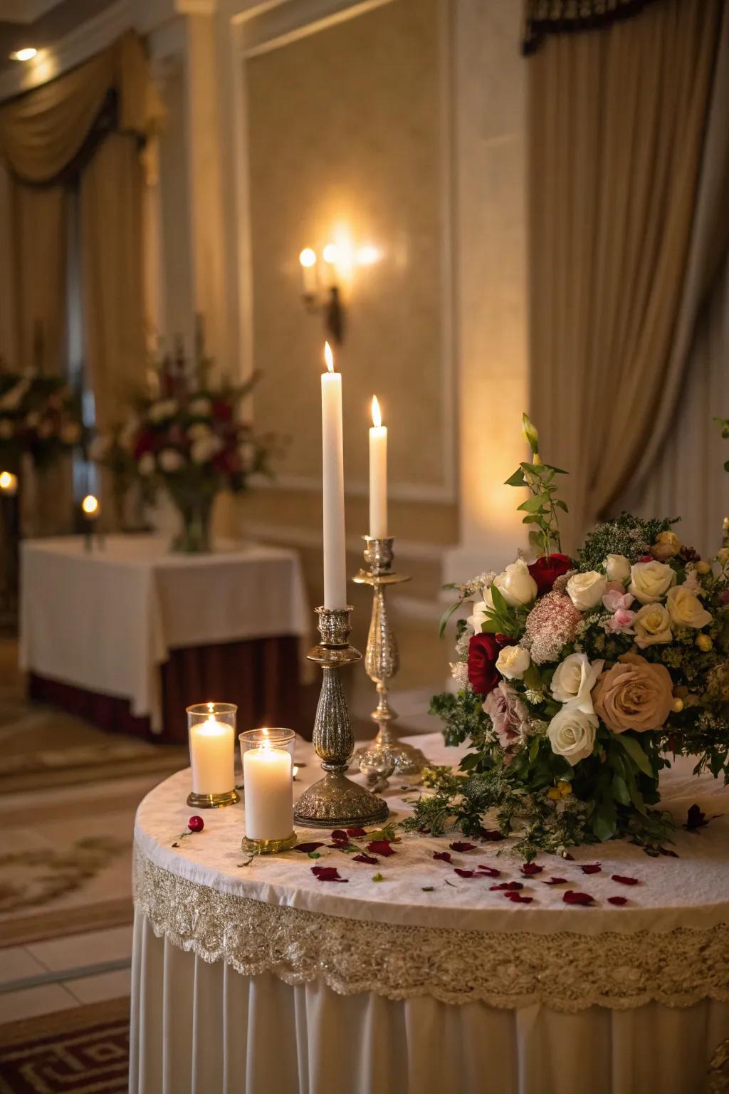 Soft lighting creates a warm ambiance for this indoor unity candle table.