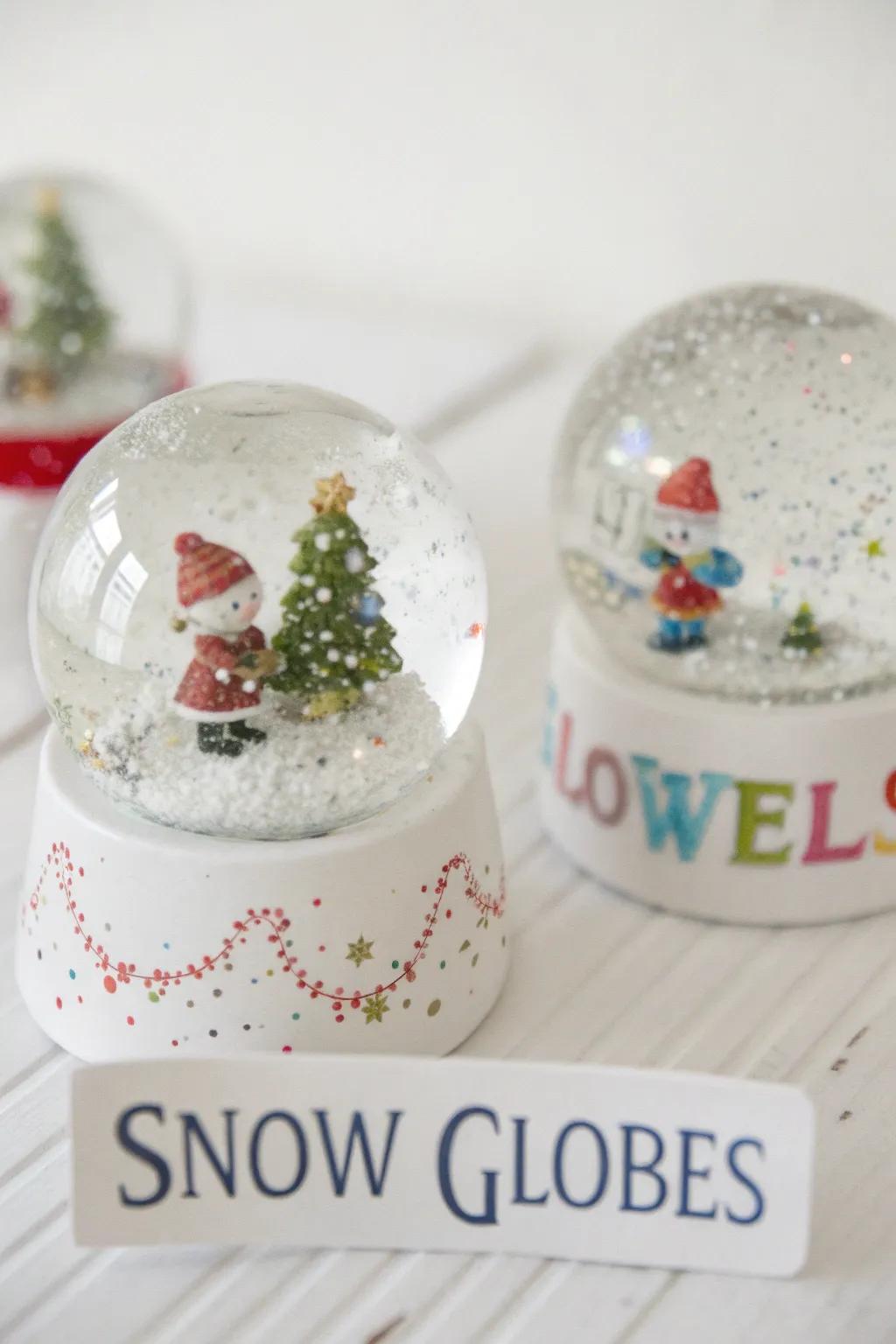 Personalized snow globes add a magical touch to your table decor.