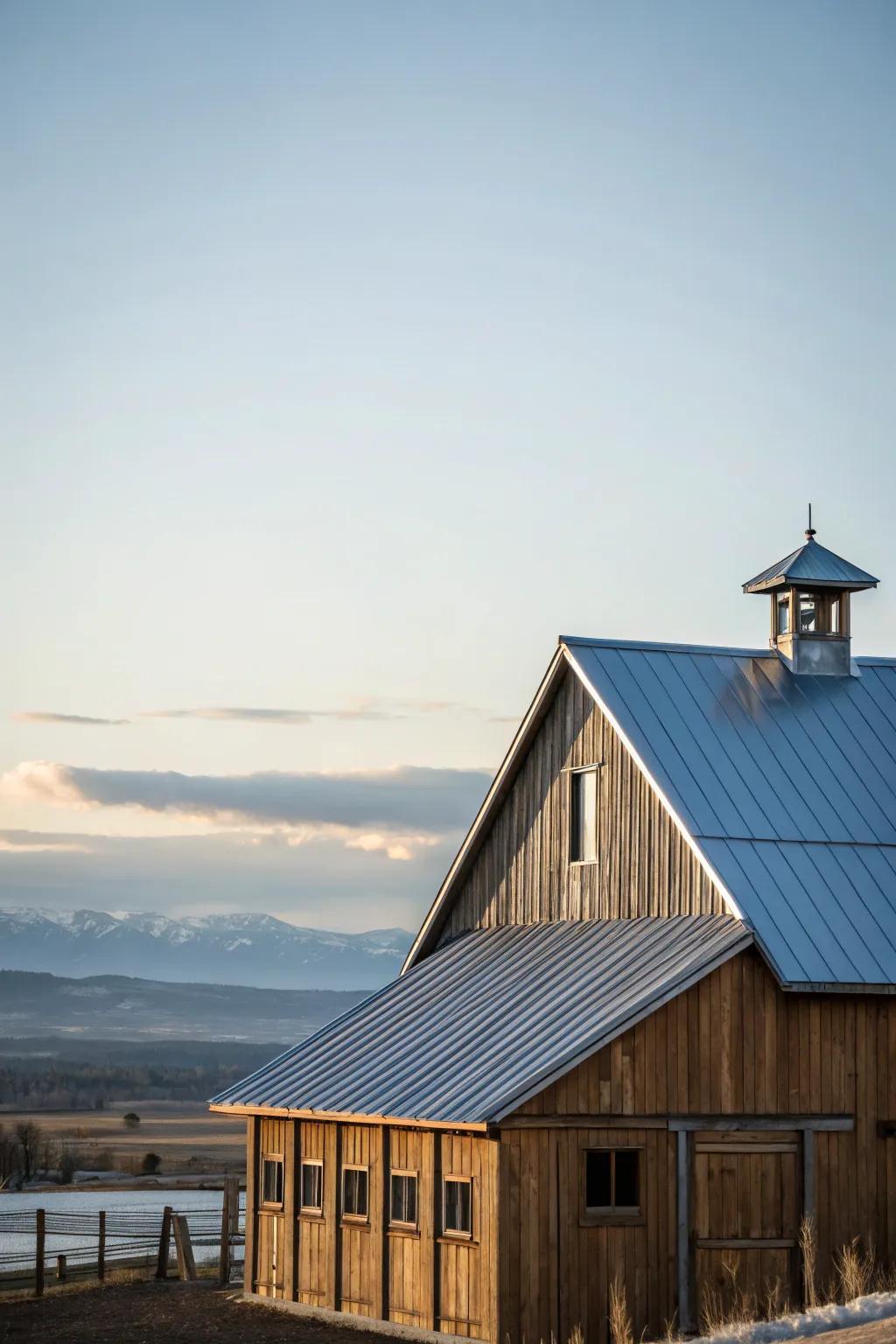 A barn house featuring a sleek and durable metal roof.
