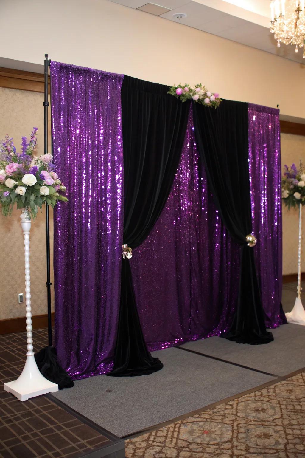 Moody reception backdrop with purple sequins and black velvet.