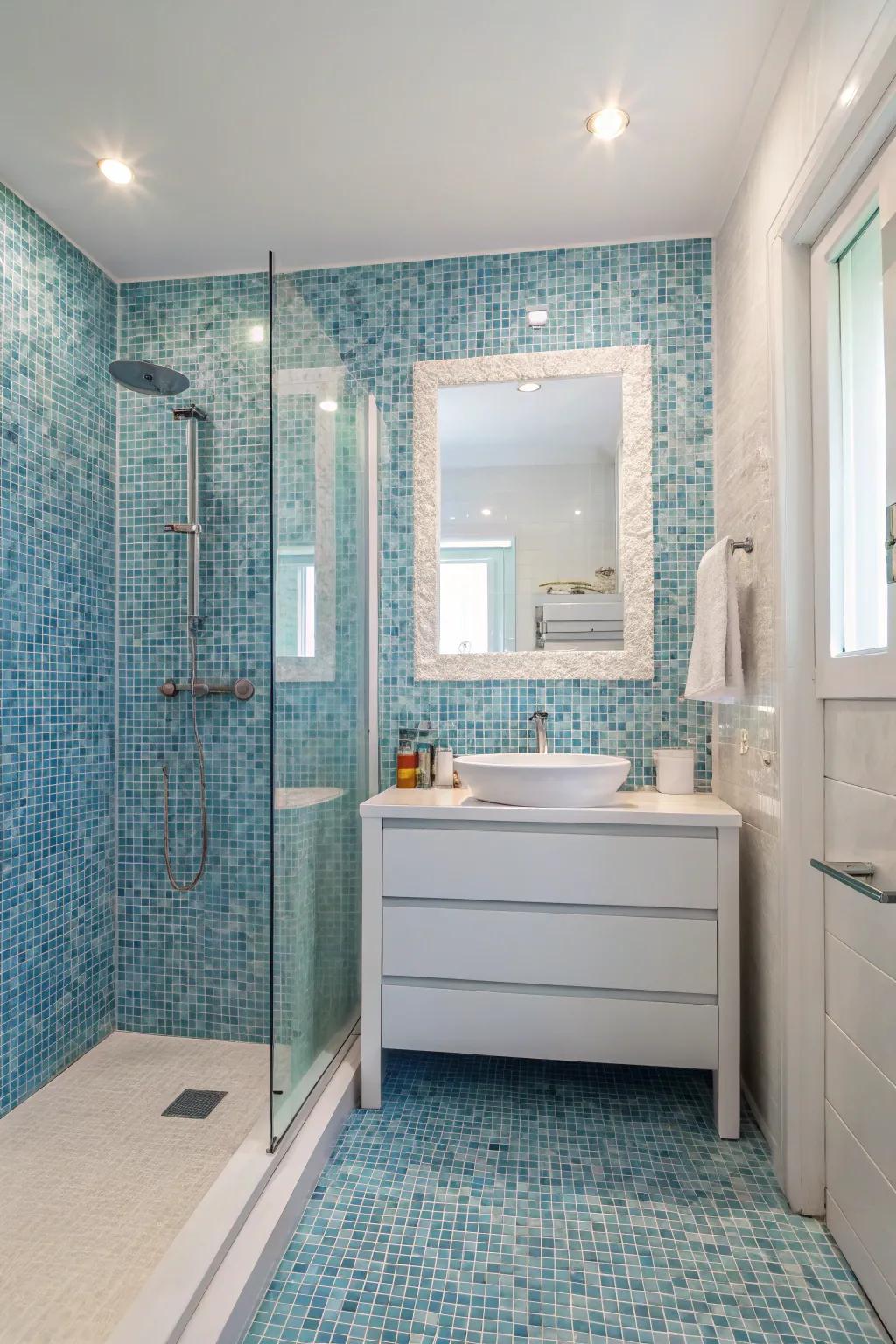 Blue mosaic tiles create an artistic and Mediterranean vibe.